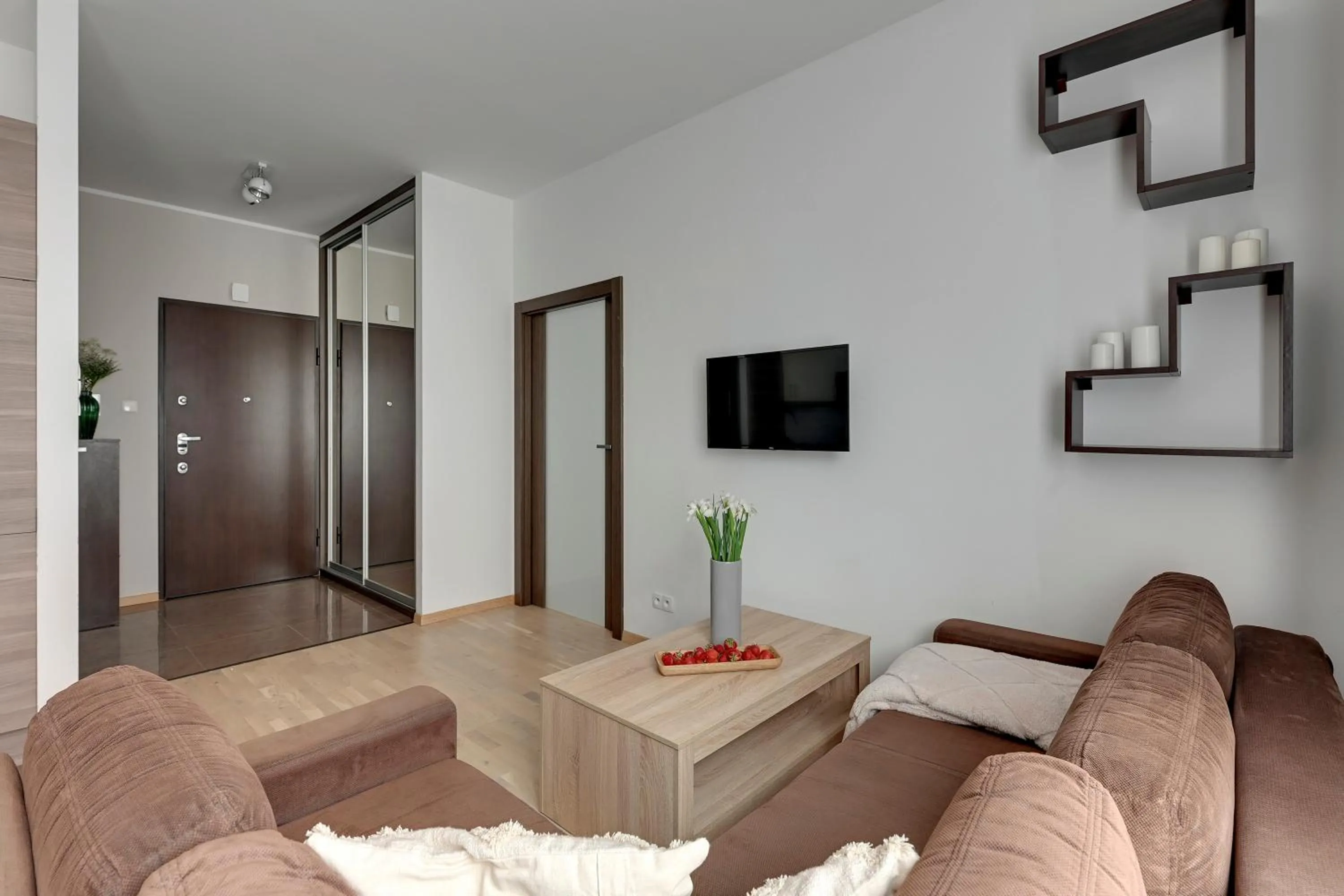 Living room in Old Town by Welcome Apartment