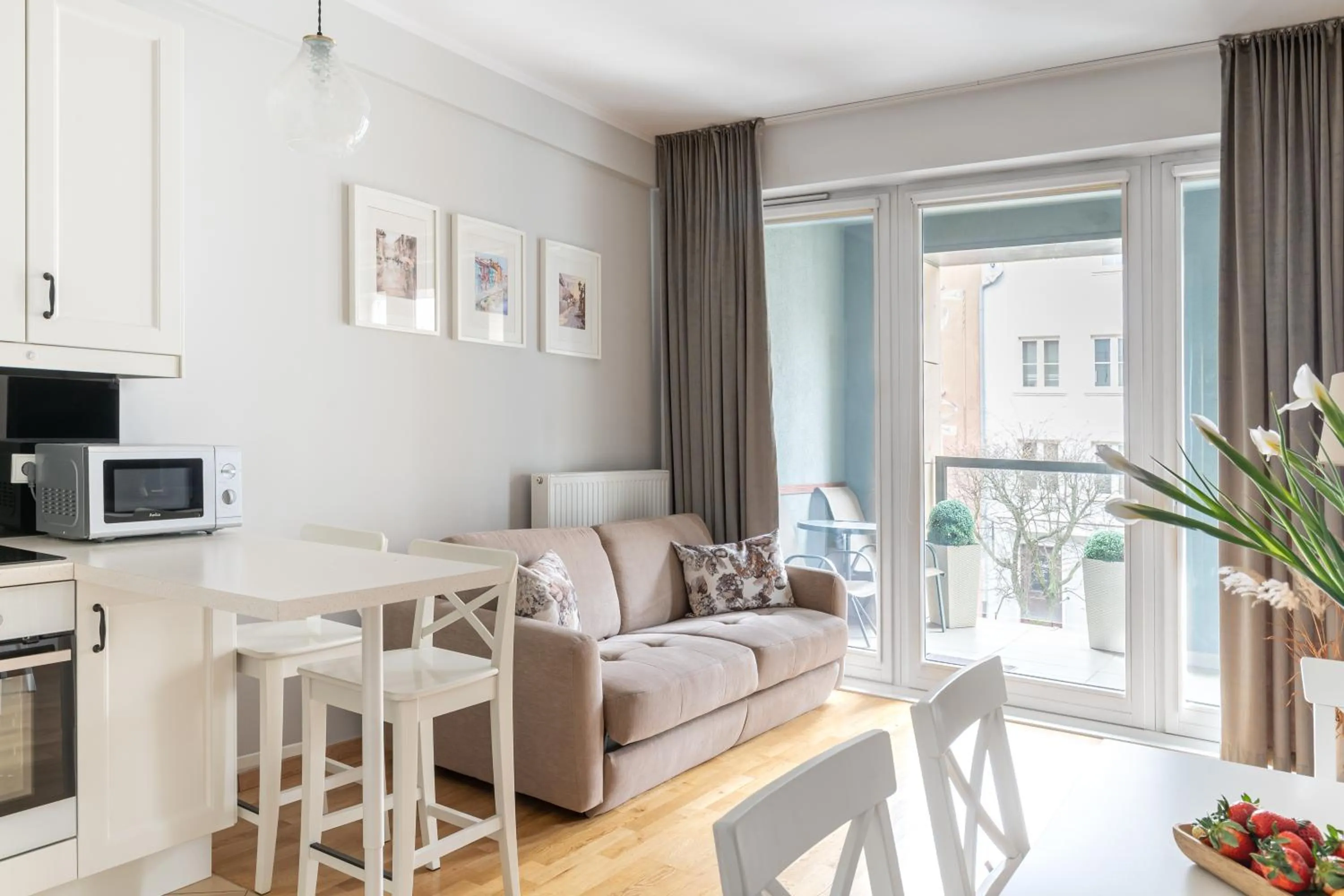 Living room in Old Town by Welcome Apartment