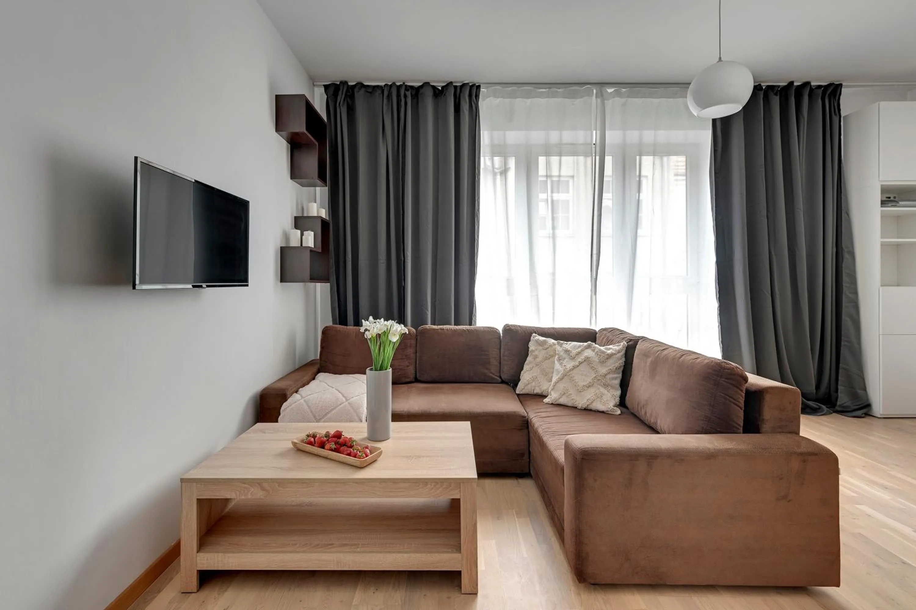 Living room in Old Town by Welcome Apartment