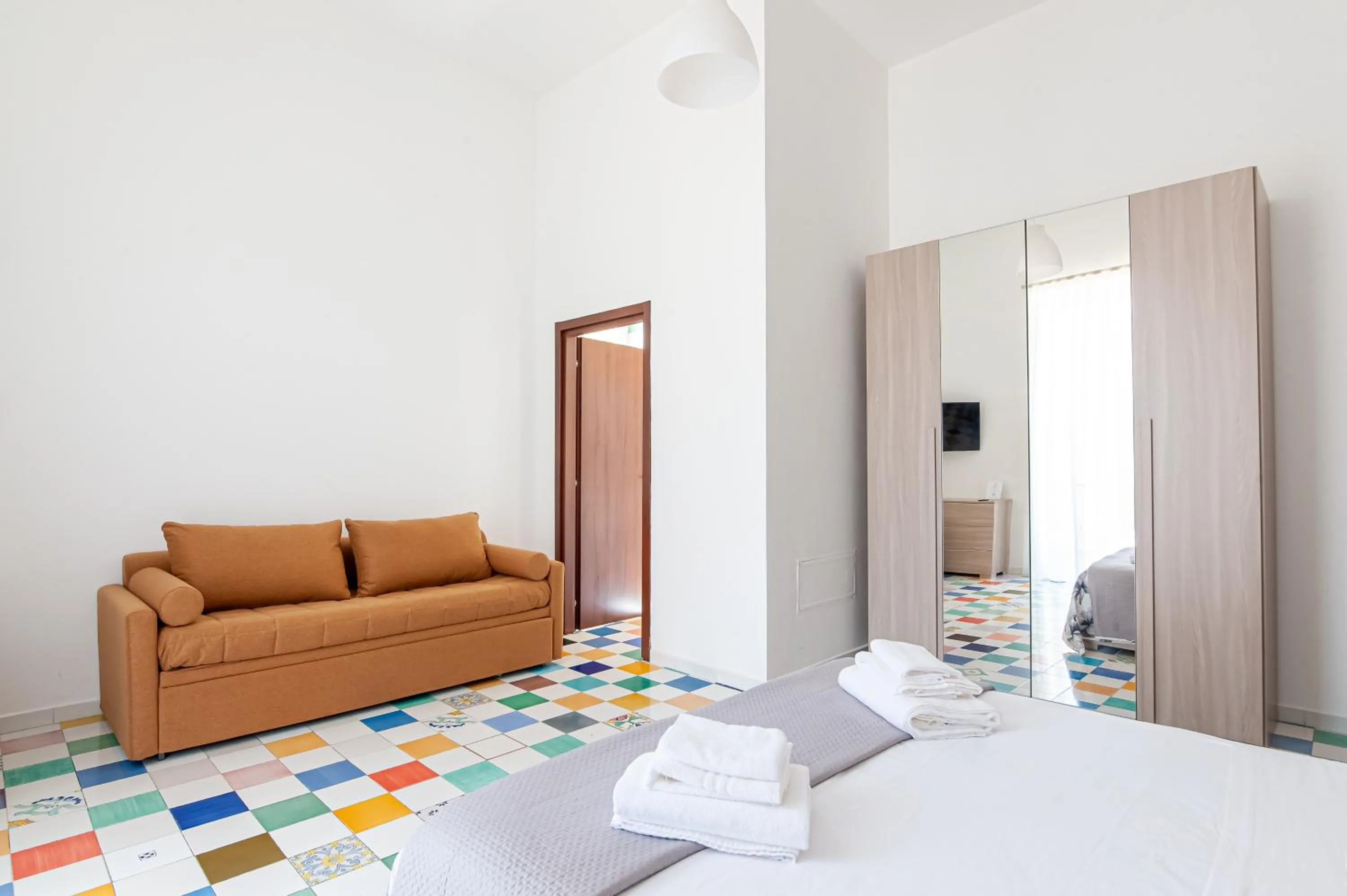 Seating area, Bed in Appartamenti La Dimora di Parthenope Centro Storico