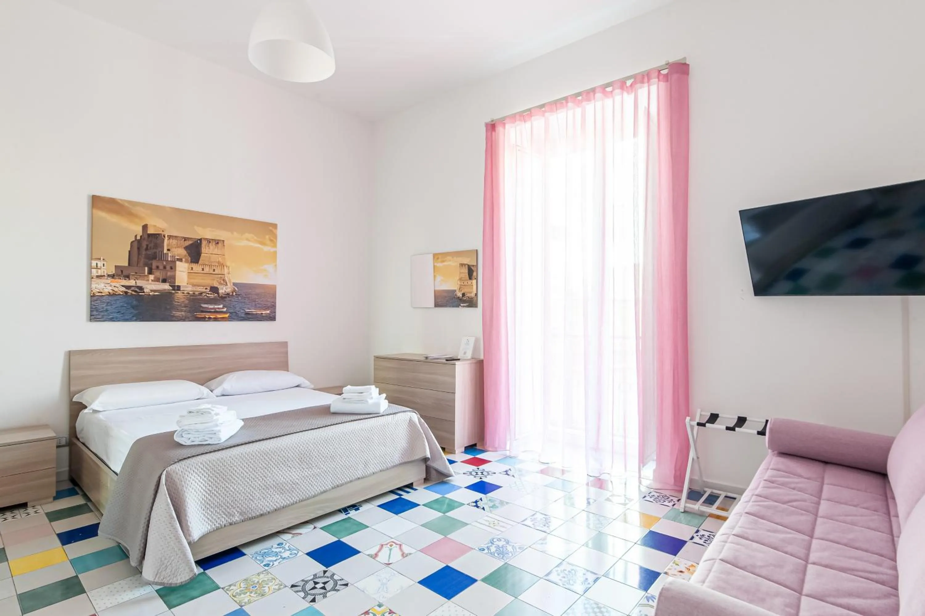 Seating area, Bed in Appartamenti La Dimora di Parthenope Centro Storico