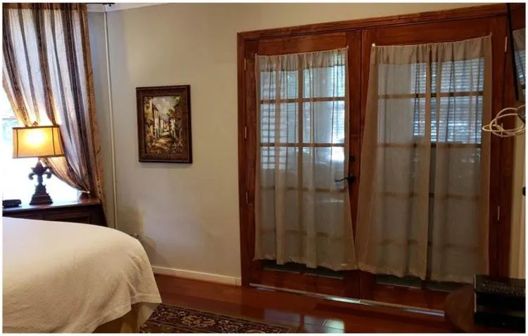 Bed in Cabernet House, an Old World Inn