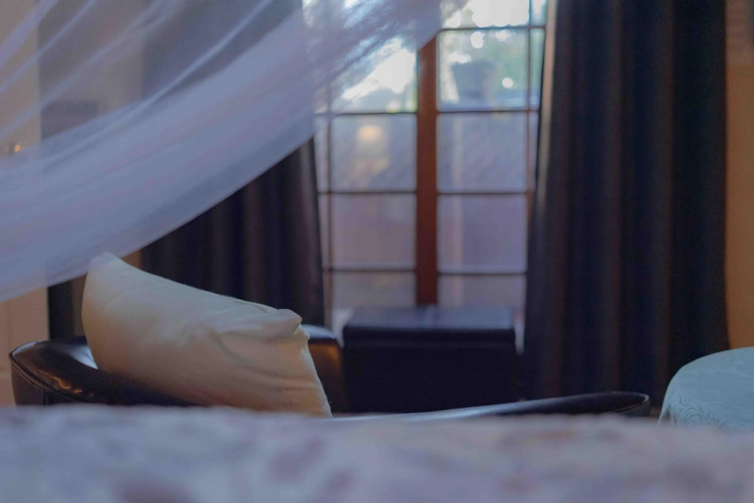 Bed in Cabernet House, an Old World Inn