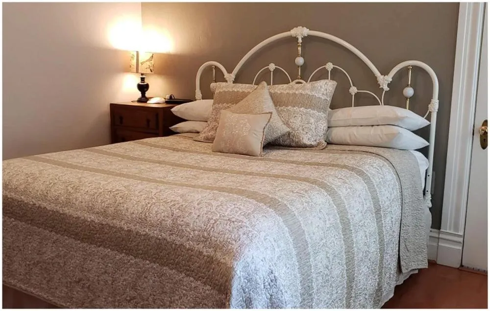 Bed in Cabernet House, an Old World Inn