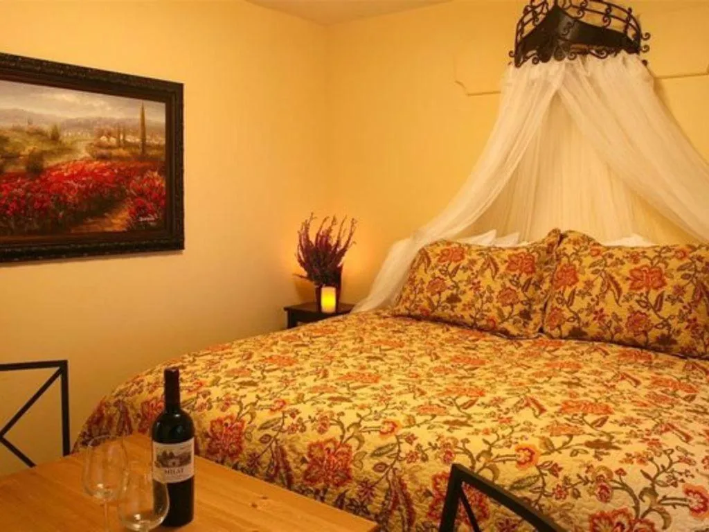 Bed in Cabernet House, an Old World Inn