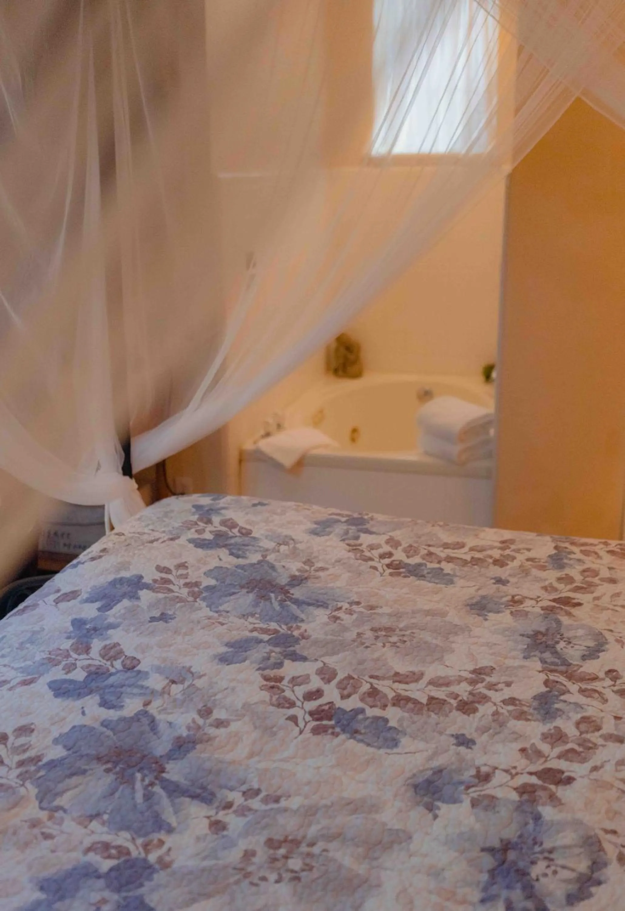 Bed in Cabernet House, an Old World Inn