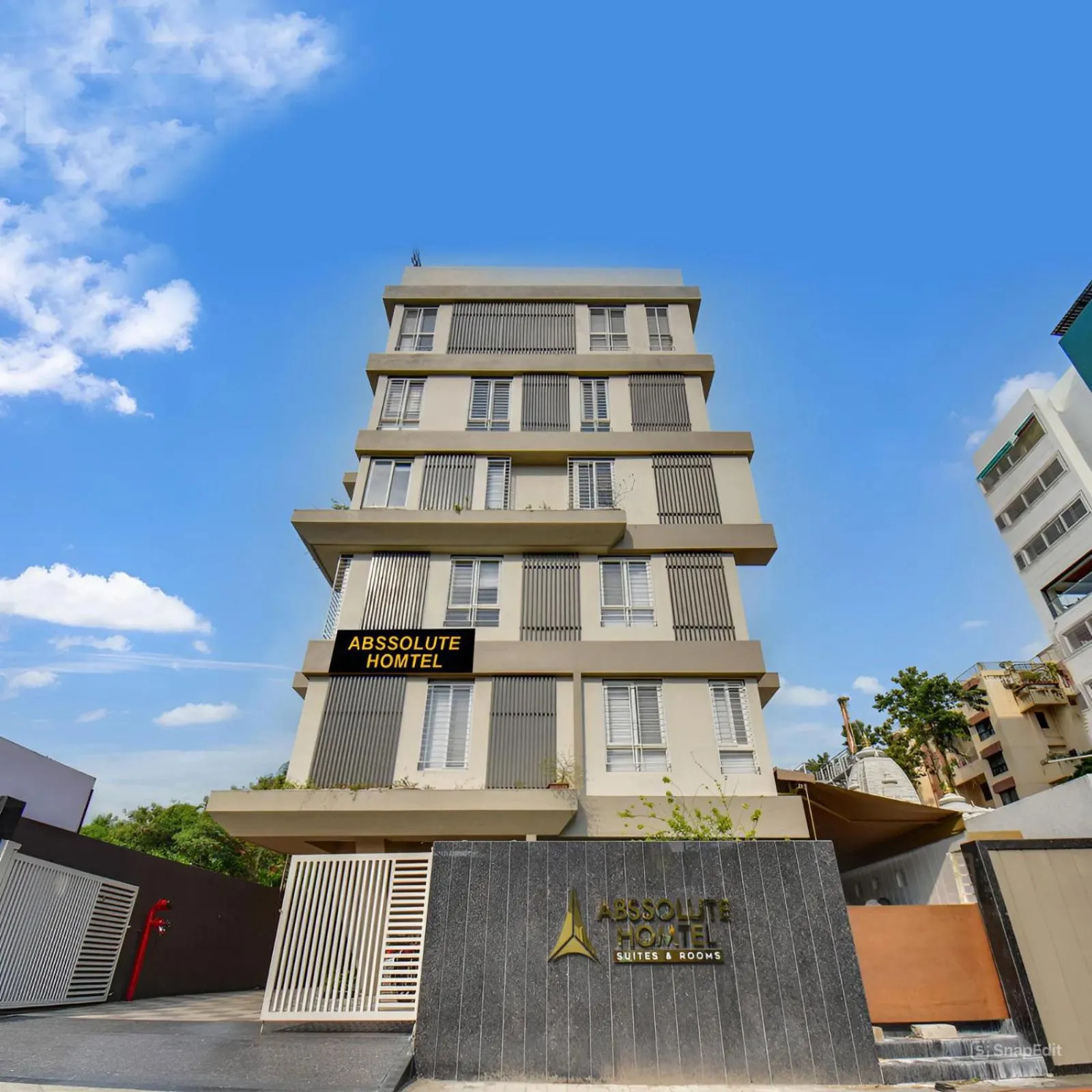 Property building in Abssolute Homtel - Rooms & Suites