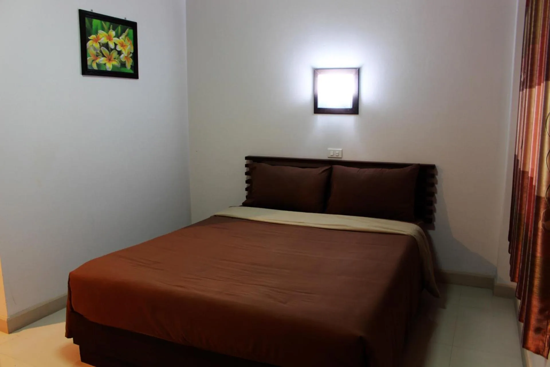 Bed in Pornkasem House