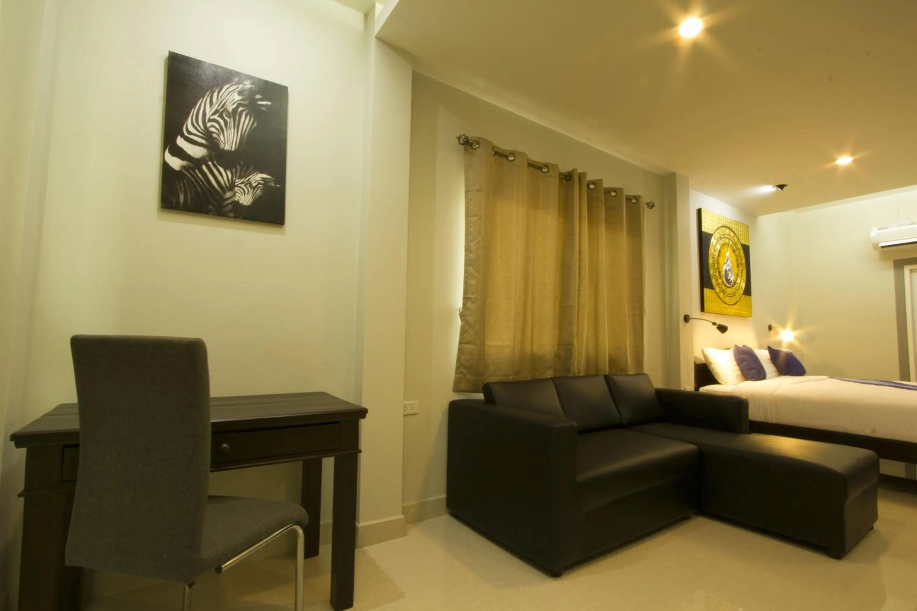 Living room, Bed in The Rise Resort