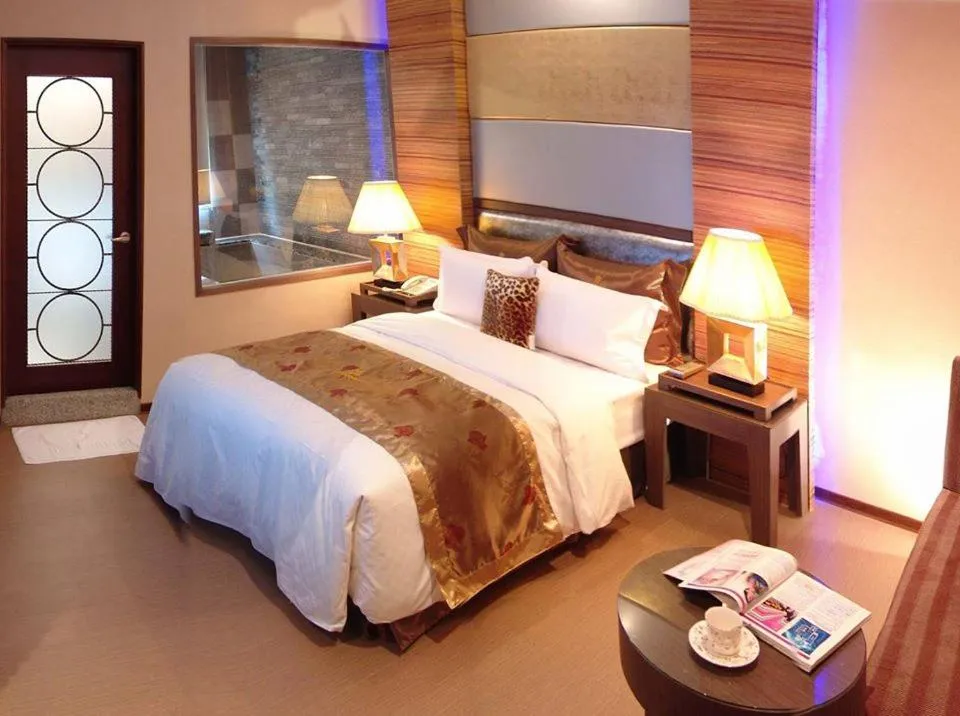 Bed in Spring Breeze Hotel