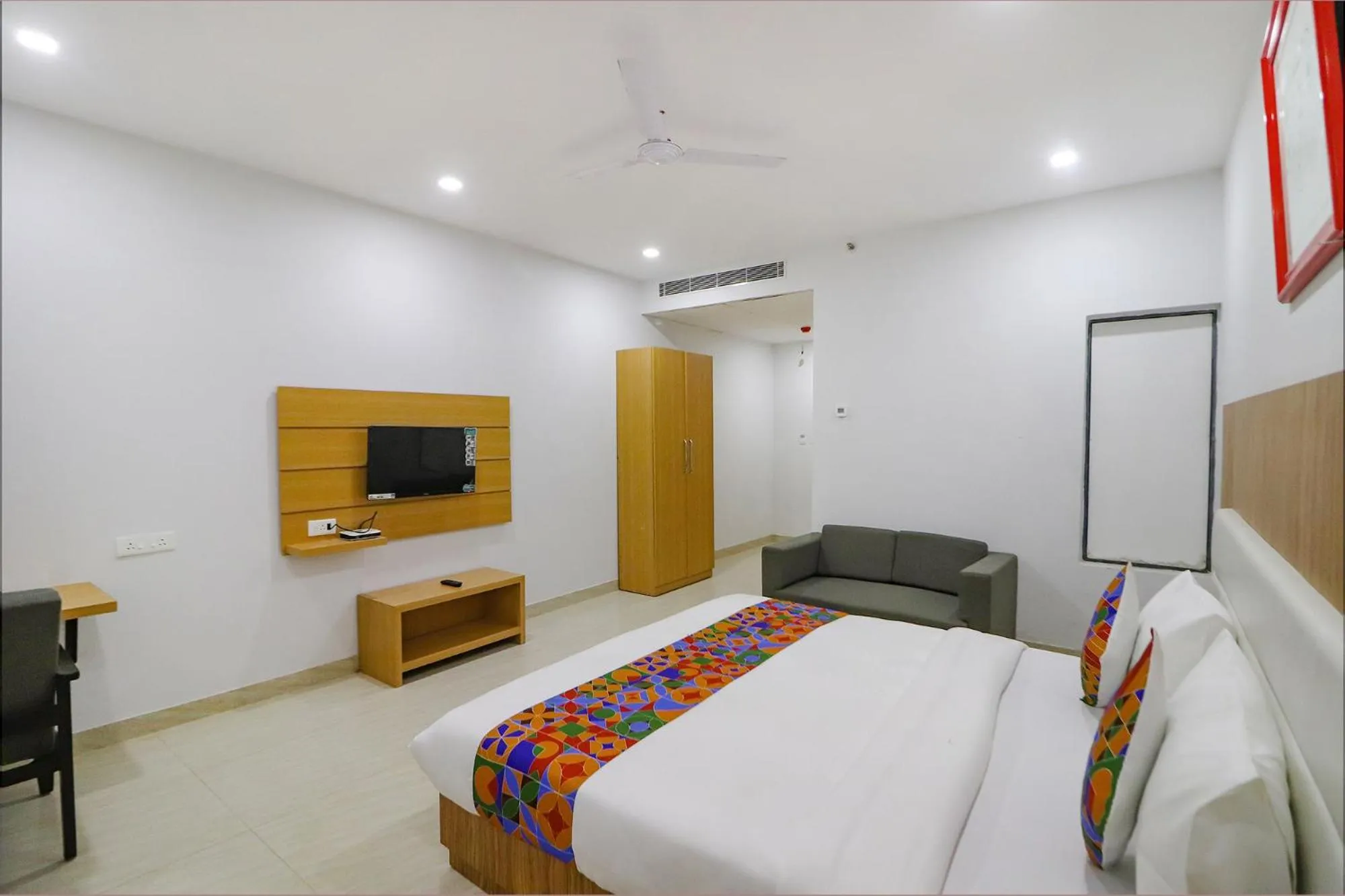 Bed in FabHotel Premium Kashi - Sarnath museum