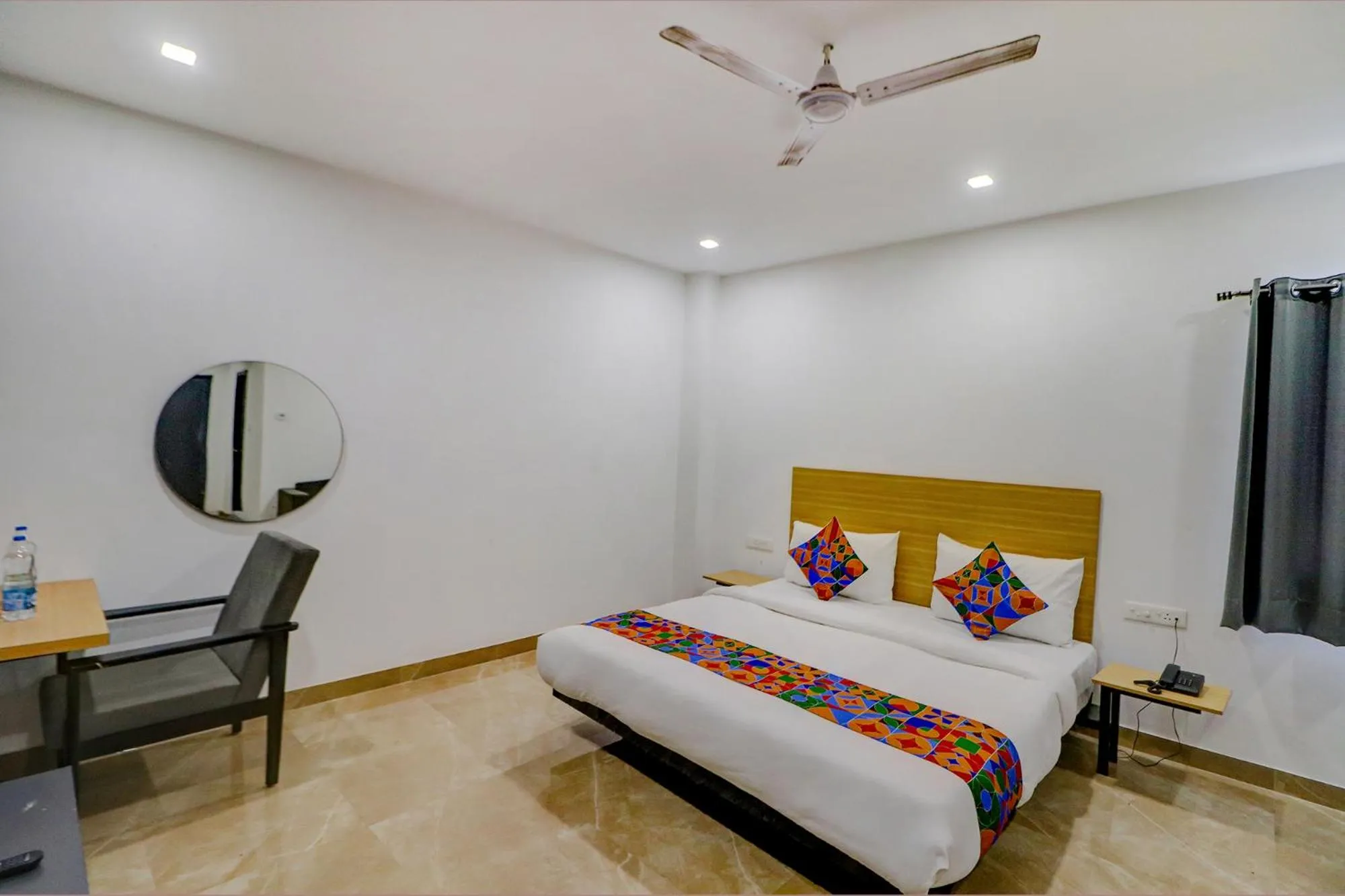 Bed in FabHotel Premium Kashi - Sarnath museum
