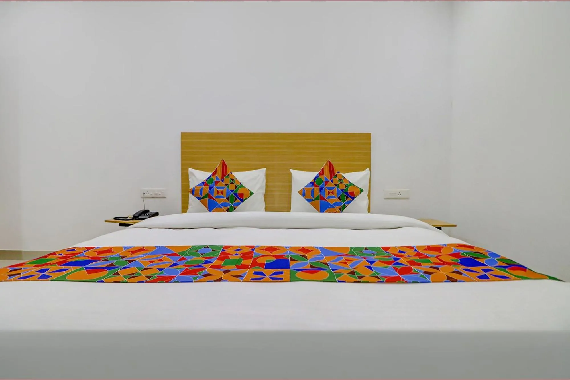 Bed in FabHotel Premium Kashi - Sarnath museum