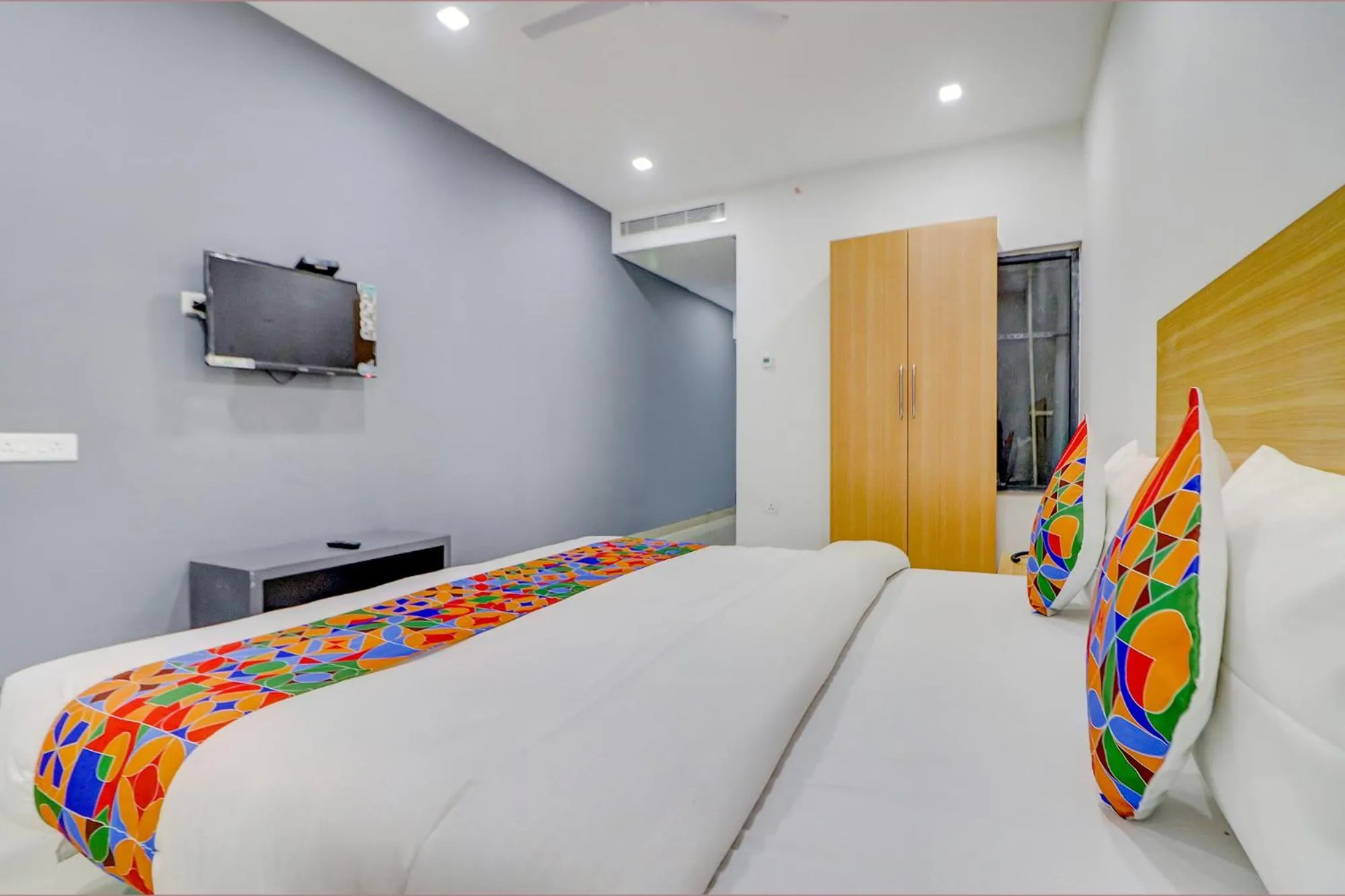 Bed in FabHotel Premium Kashi - Sarnath museum