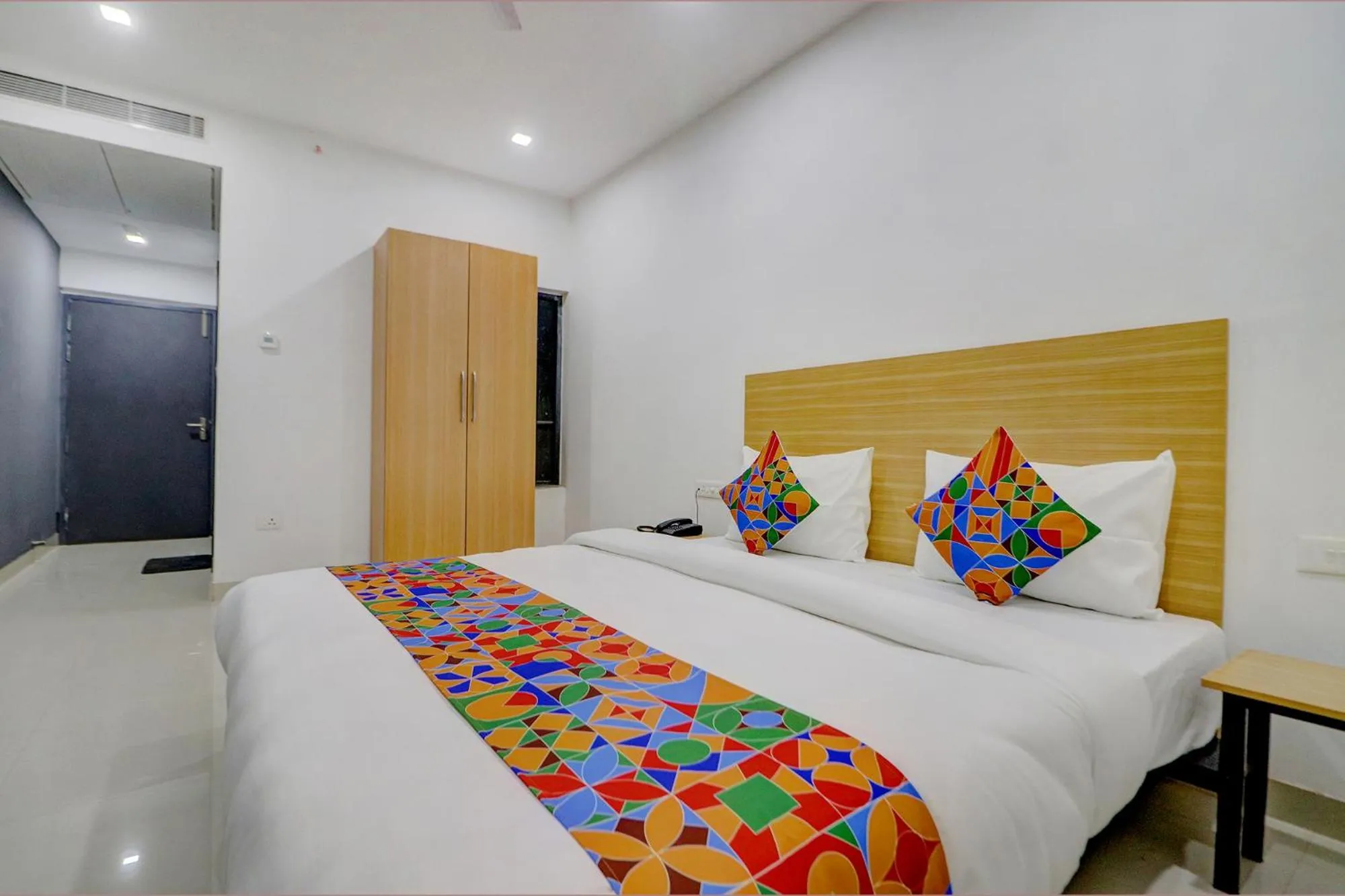 Bed in FabHotel Premium Kashi - Sarnath museum