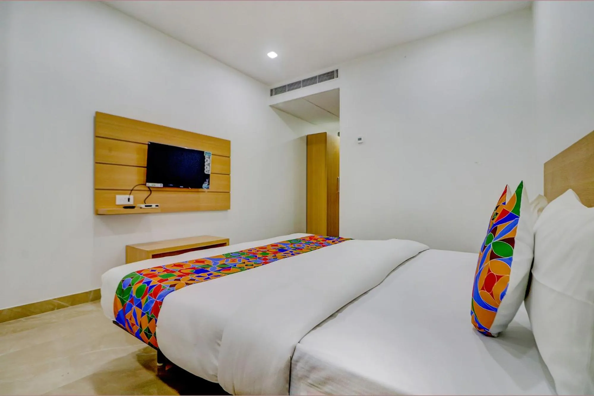 Bed in FabHotel Premium Kashi - Sarnath museum