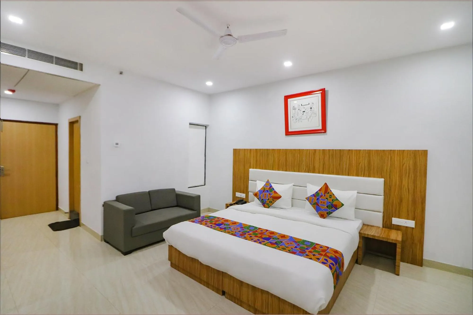 Bed in FabHotel Premium Kashi - Sarnath museum