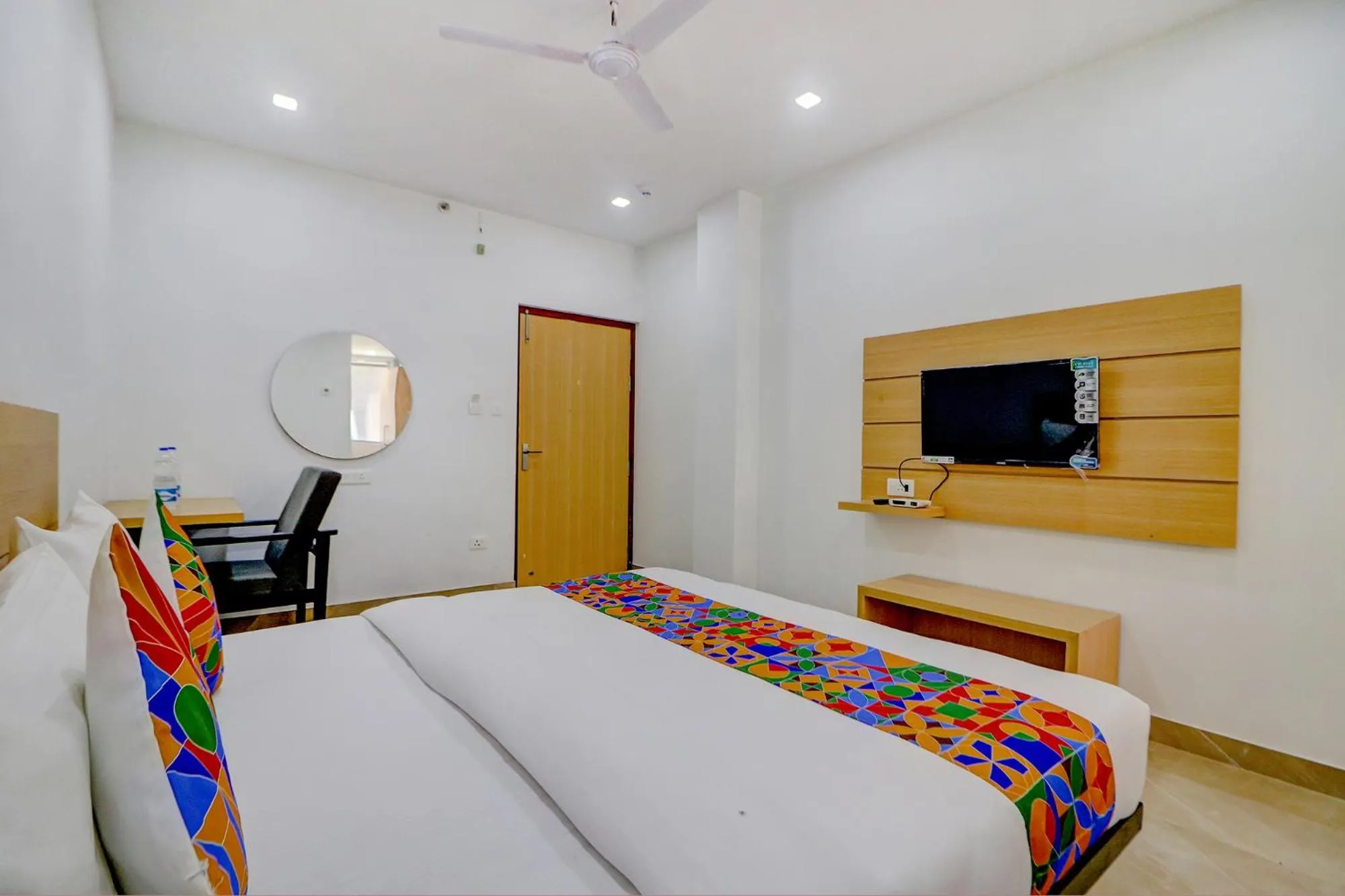 Bed in FabHotel Premium Kashi - Sarnath museum