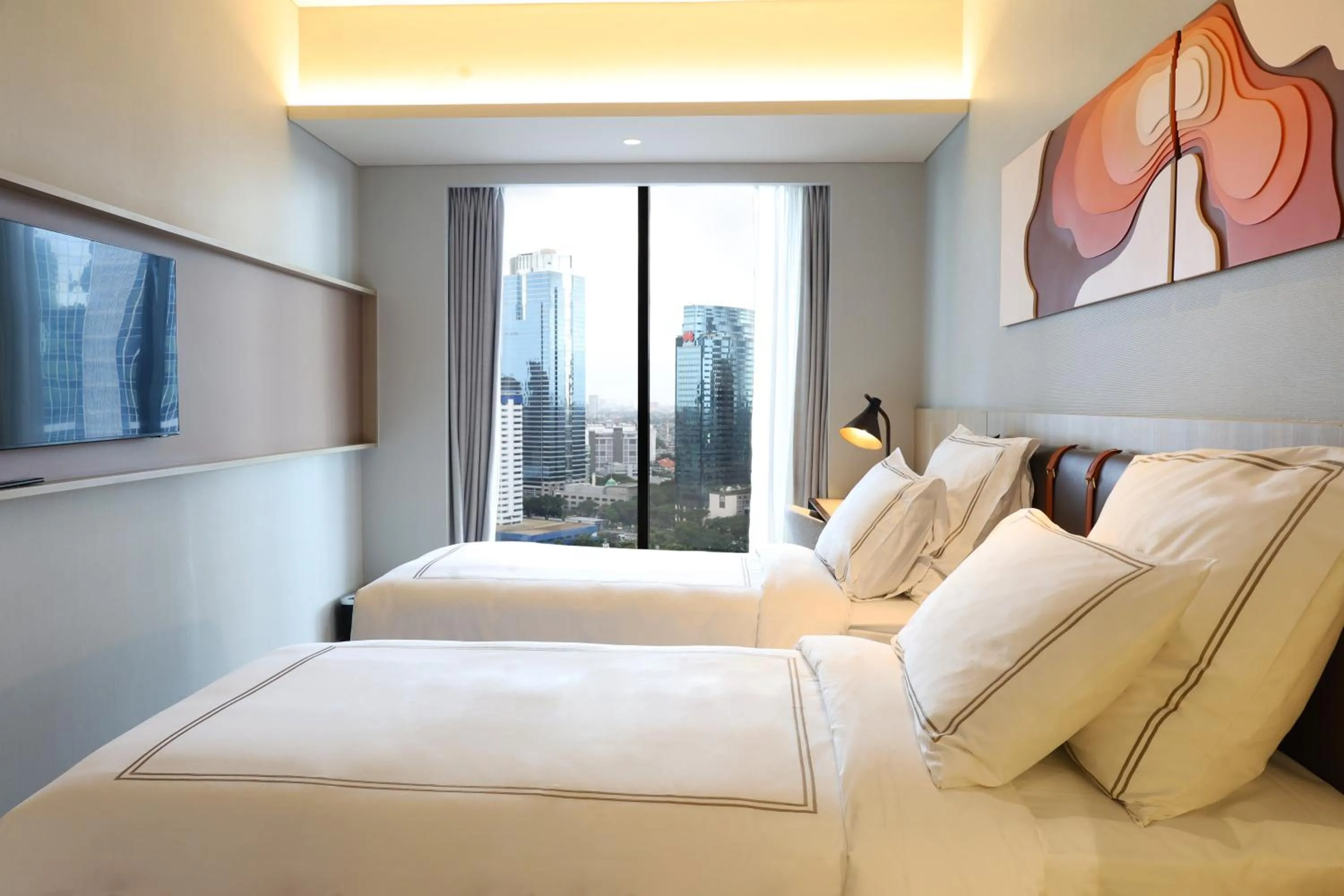 Bed in Swissôtel Living Jakarta Mega Kuningan