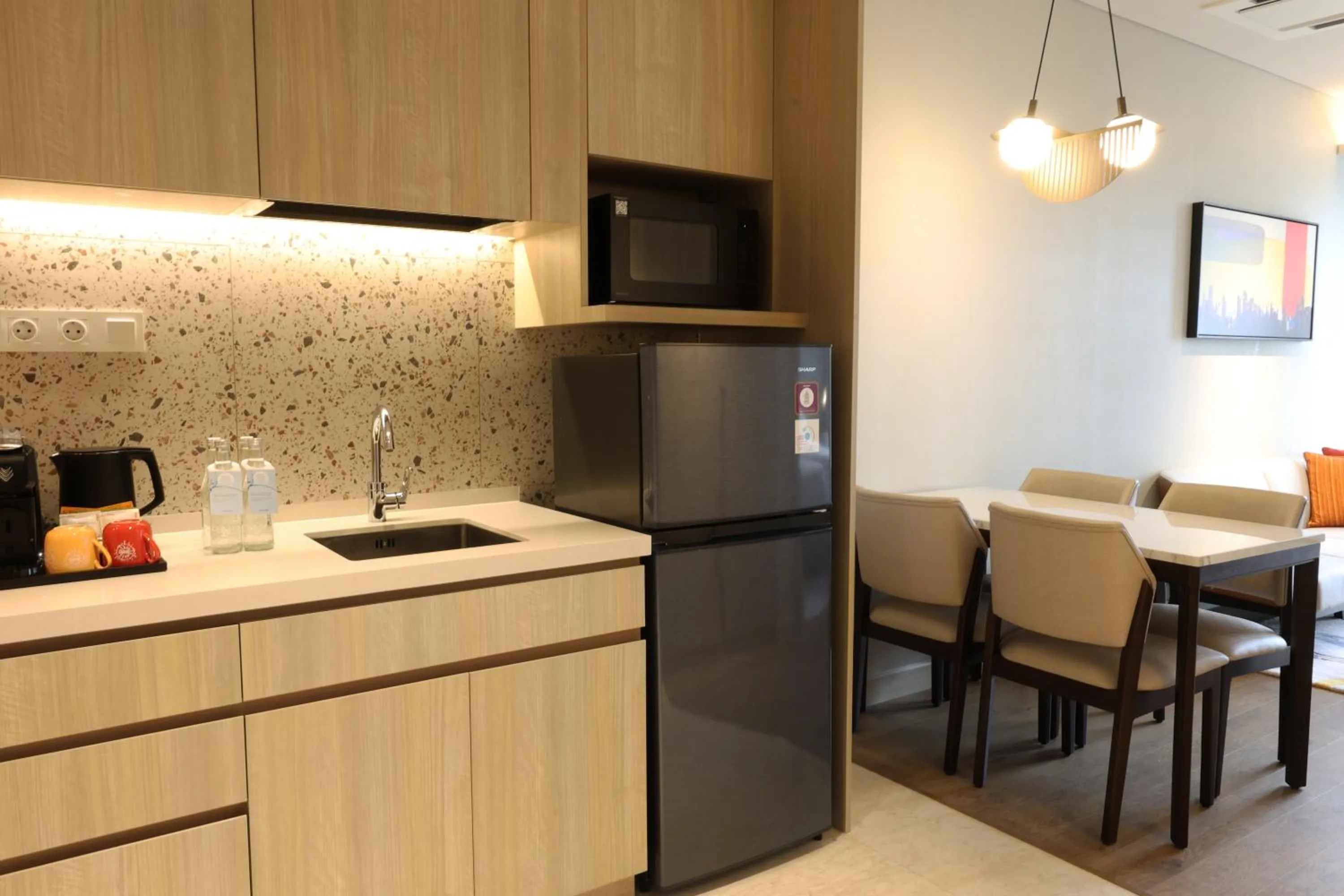 Dining area in Swissôtel Living Jakarta Mega Kuningan