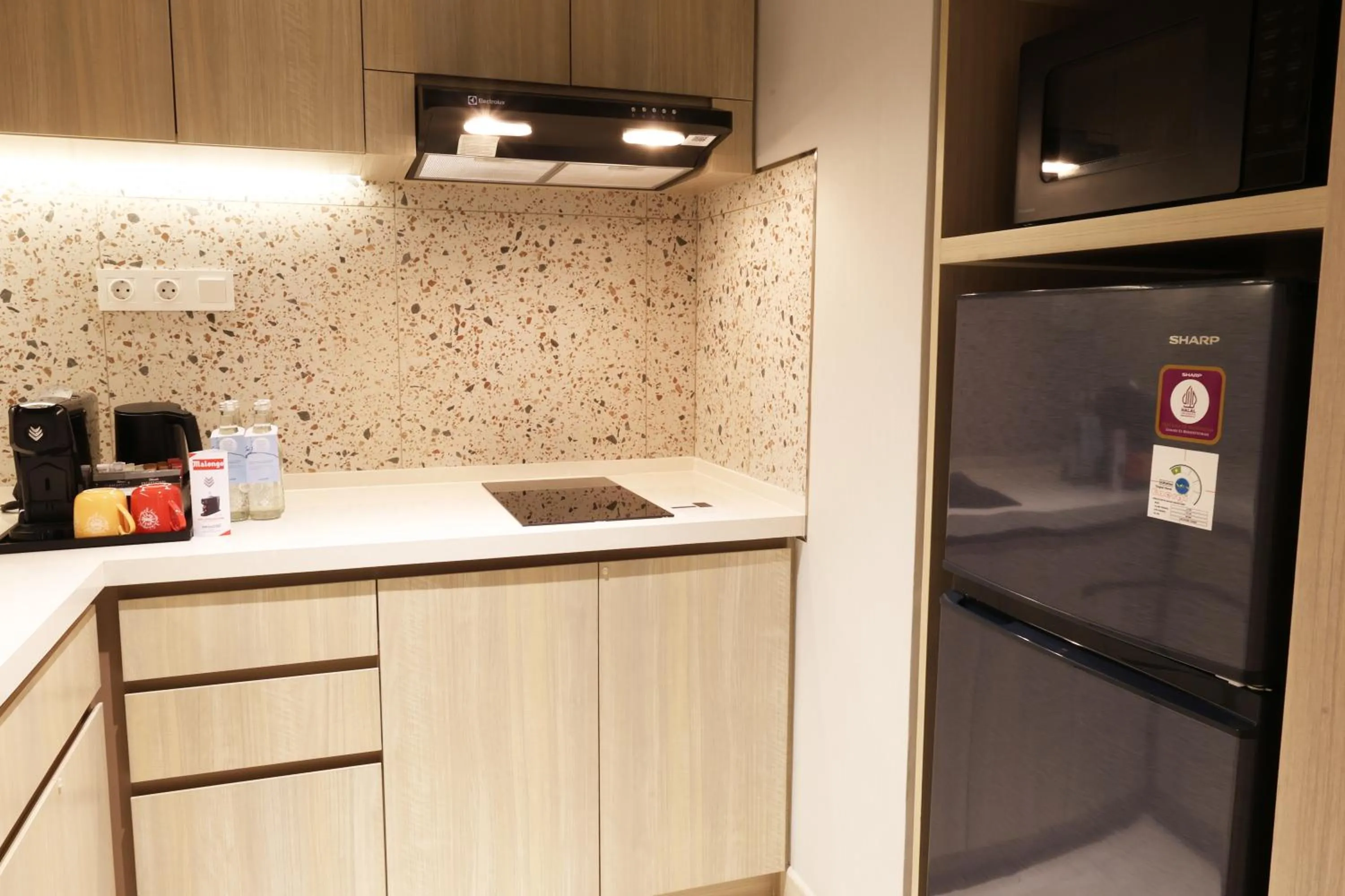 kitchen in Swissôtel Living Jakarta Mega Kuningan