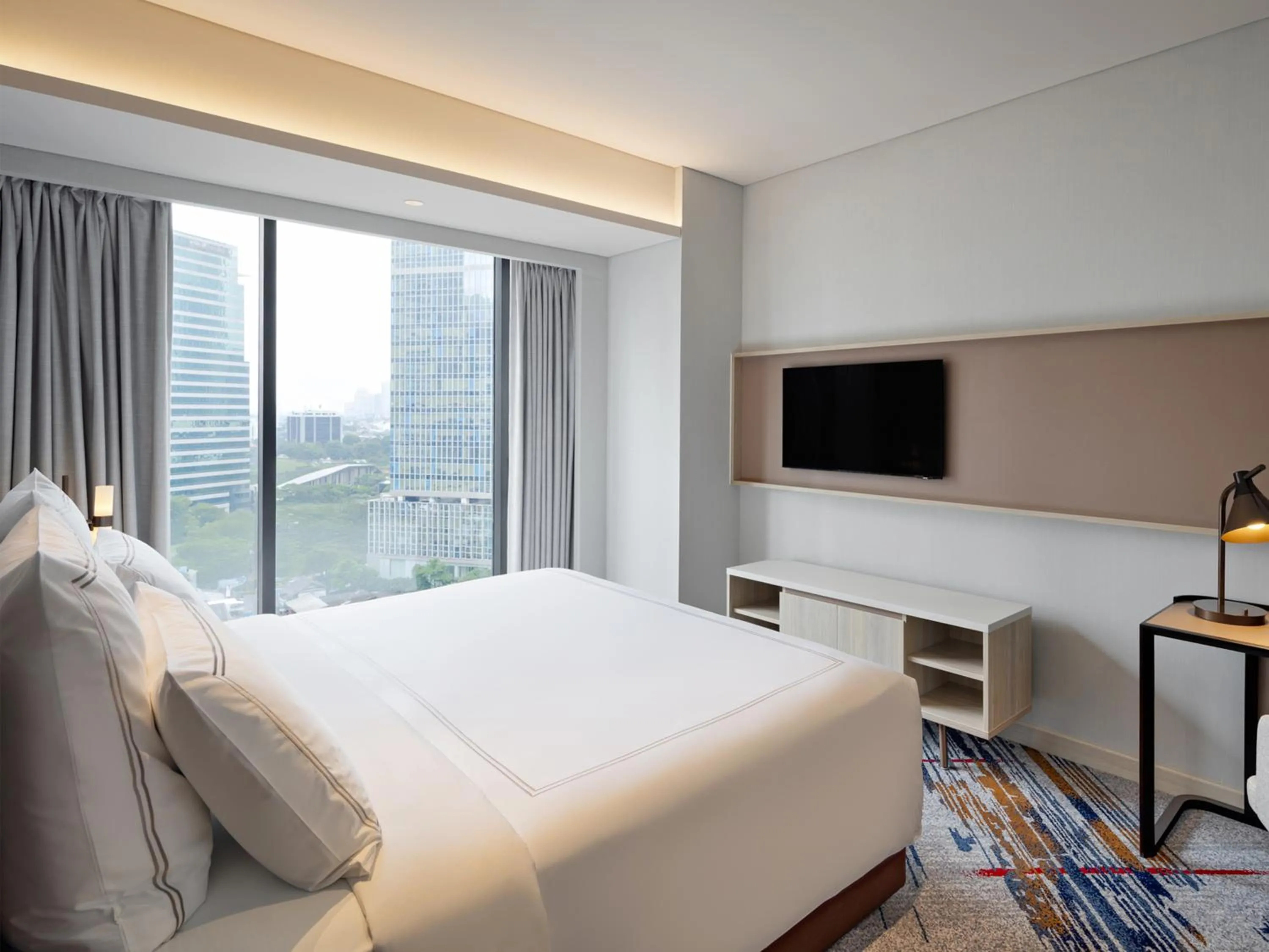 Bed in Swissôtel Living Jakarta Mega Kuningan