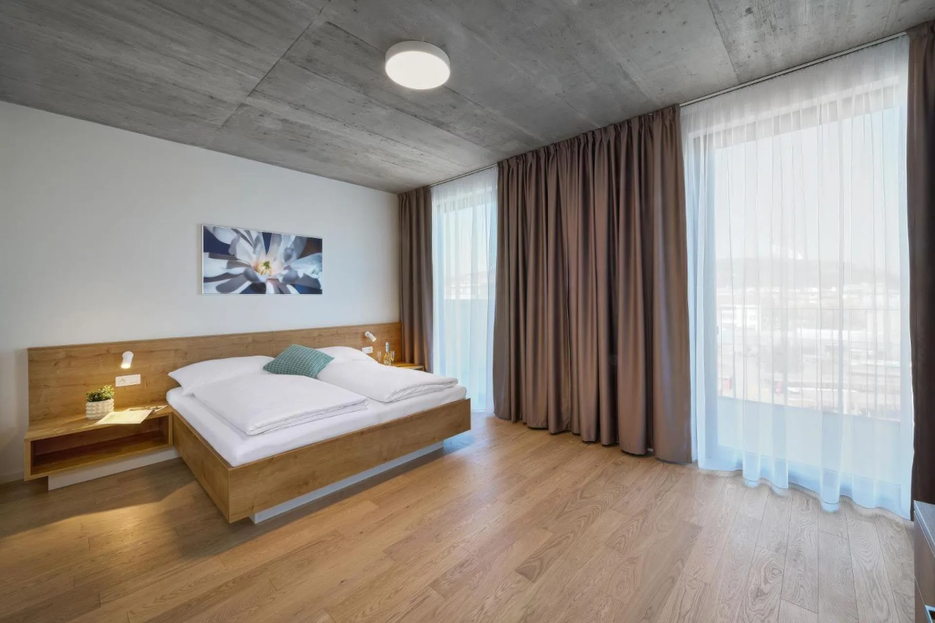 Bed in DownTown Suites Andel