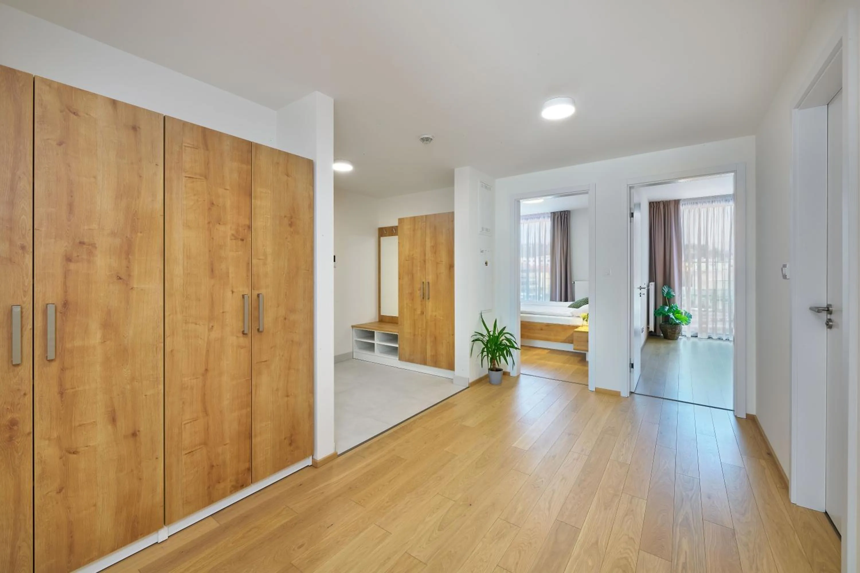 Bedroom, Bed in DownTown Suites Andel