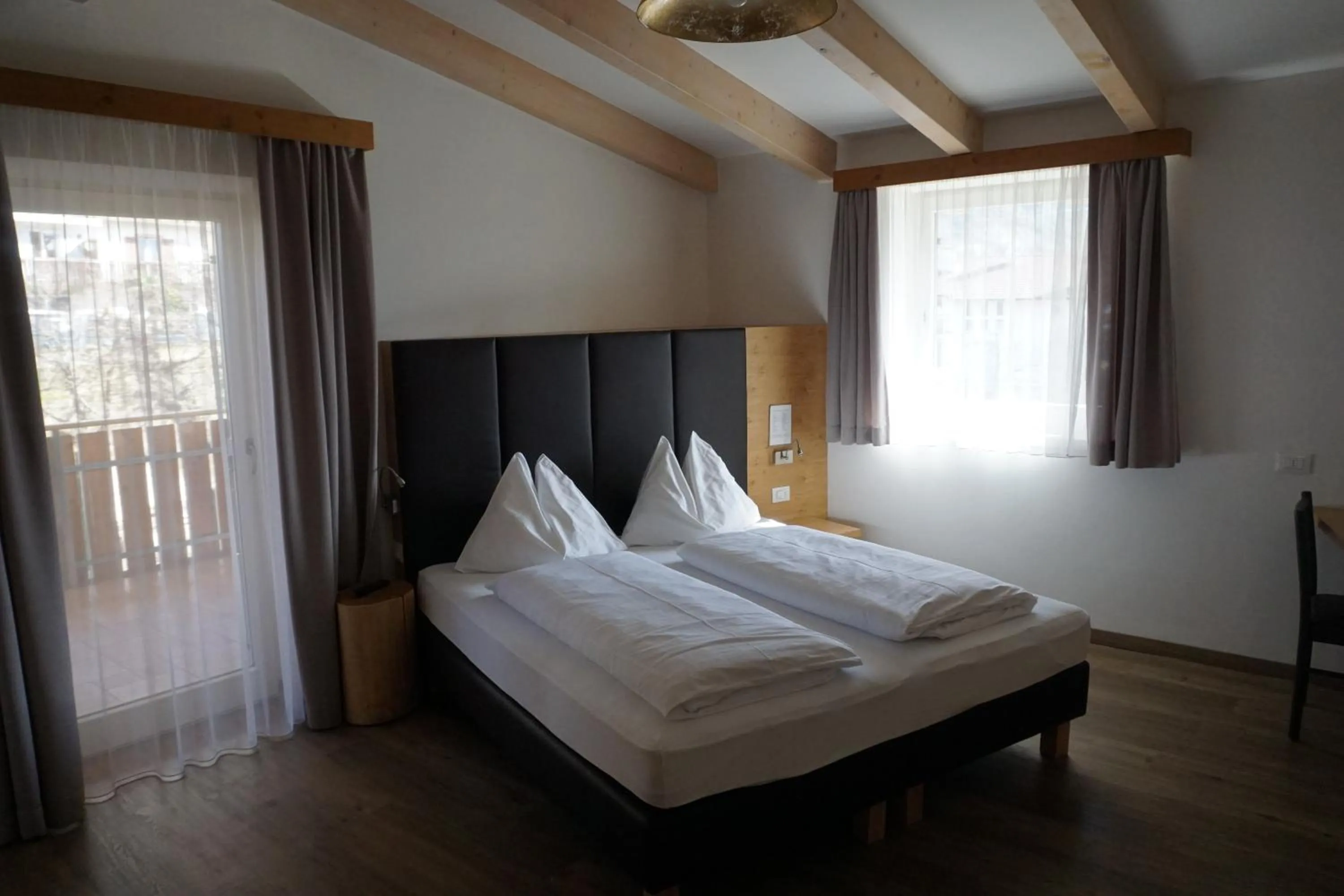 Bedroom, Bed in Guesthouse Dolomiten