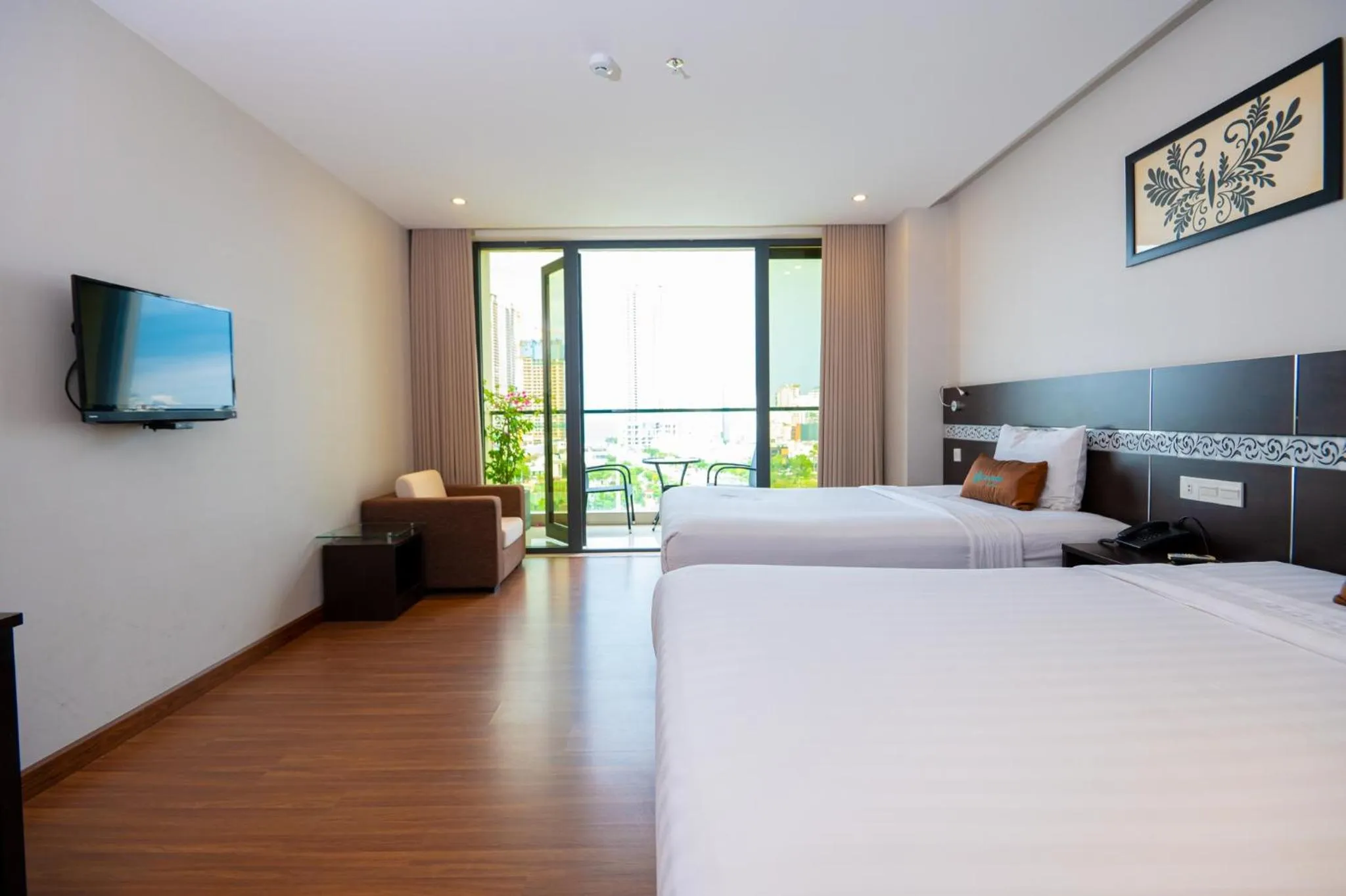 Bed in Sea Garden Hotel