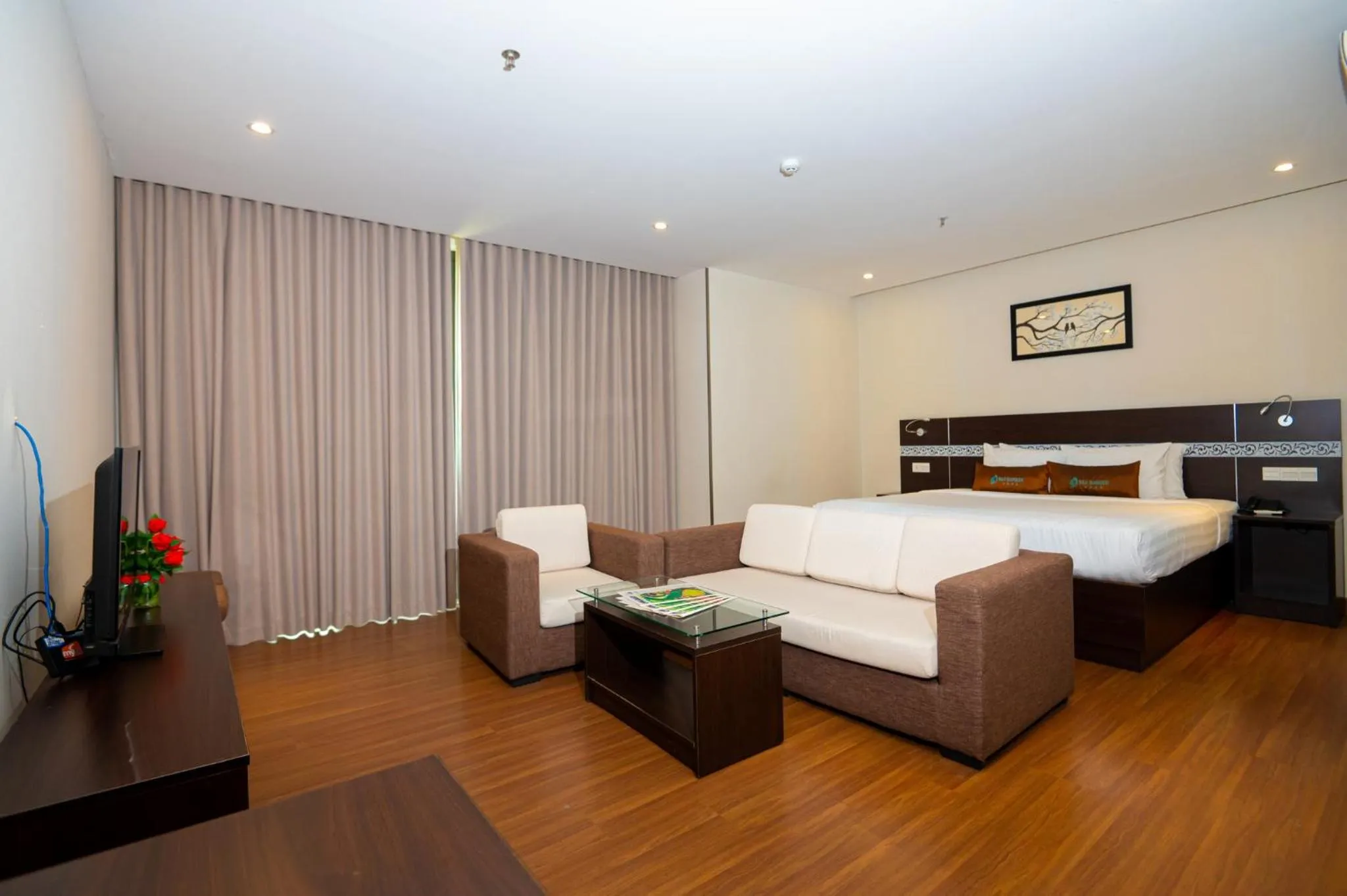 Living room, Bed in Sea Garden Hotel