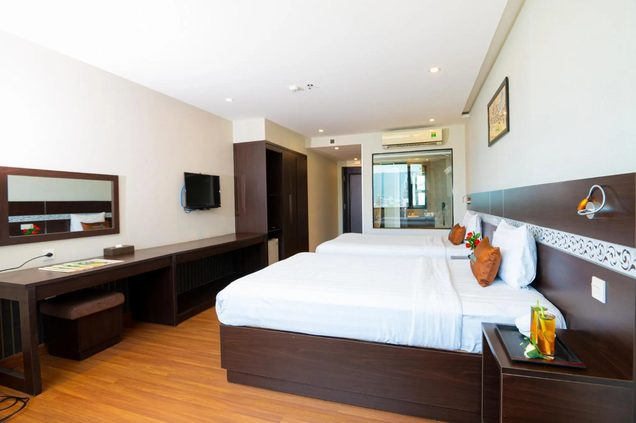 Bed in Sea Garden Hotel