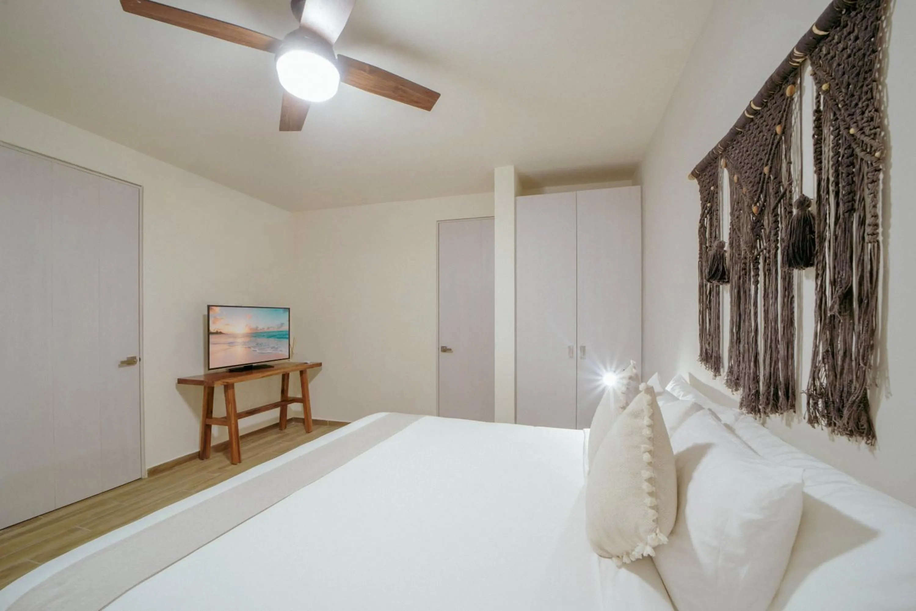 Bed in K'uyen Boutique Hotel