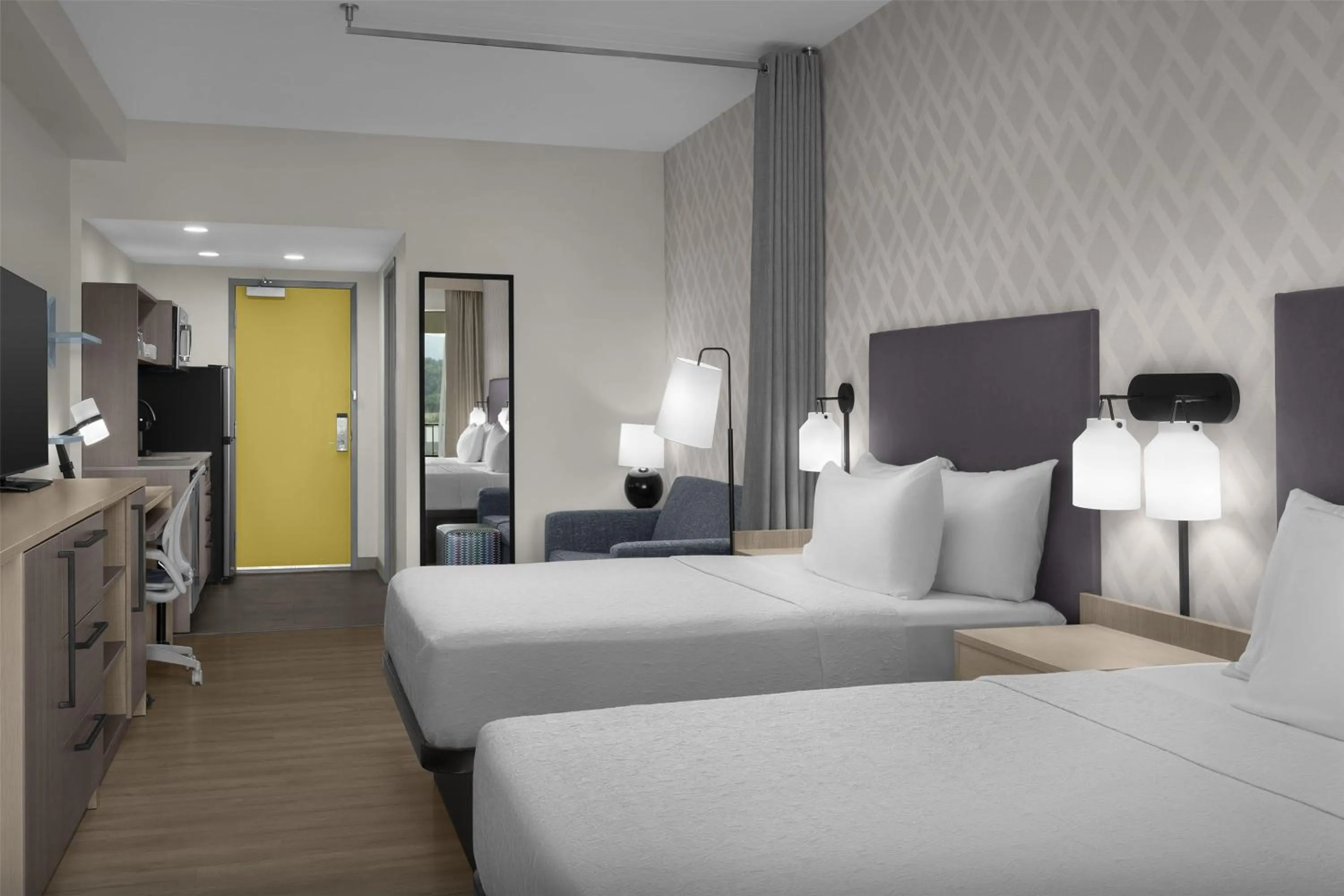 Living room, Bed in Home2 Suites By Hilton Sevierville