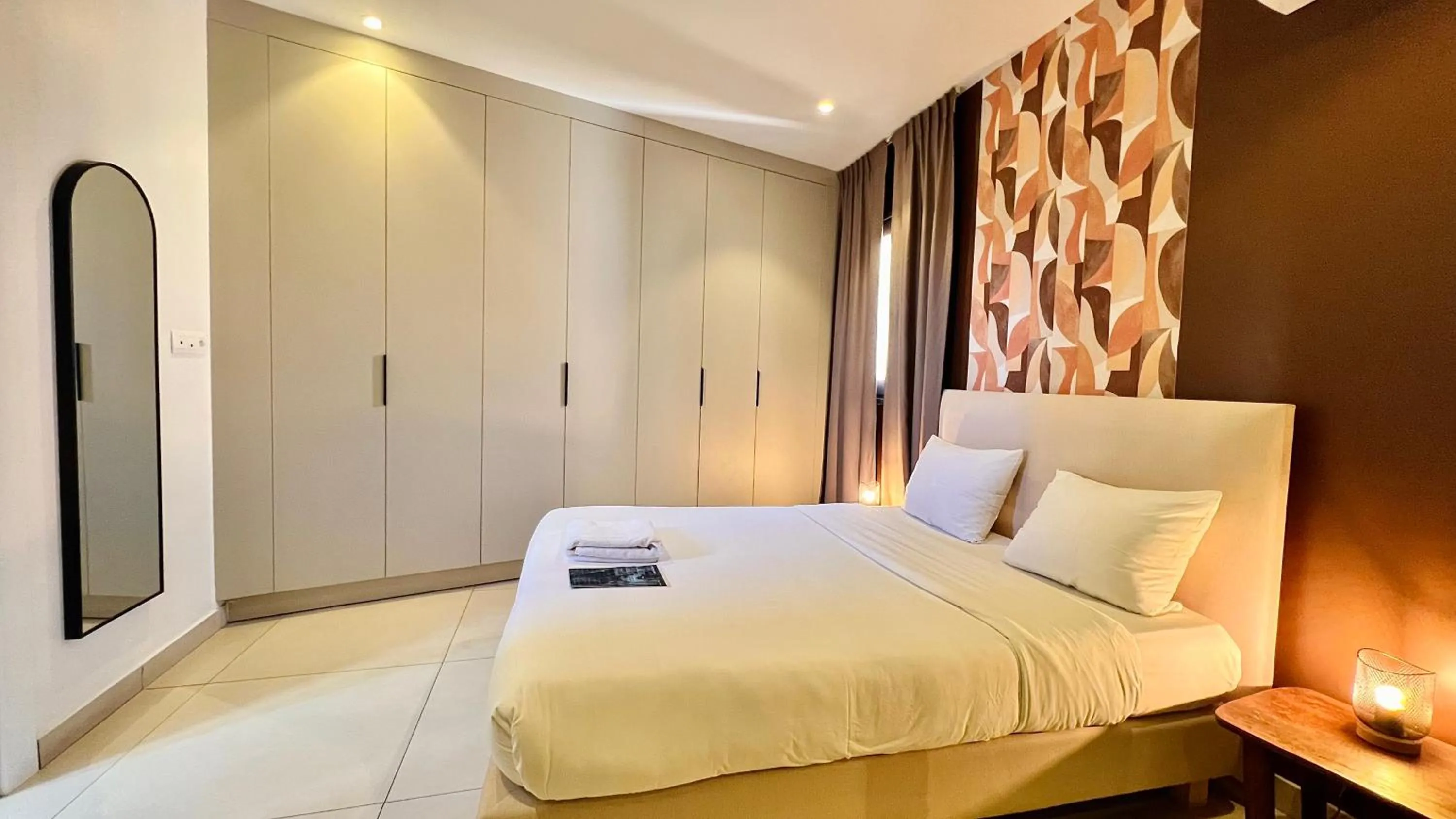 Bed in AfricaWorks Suites