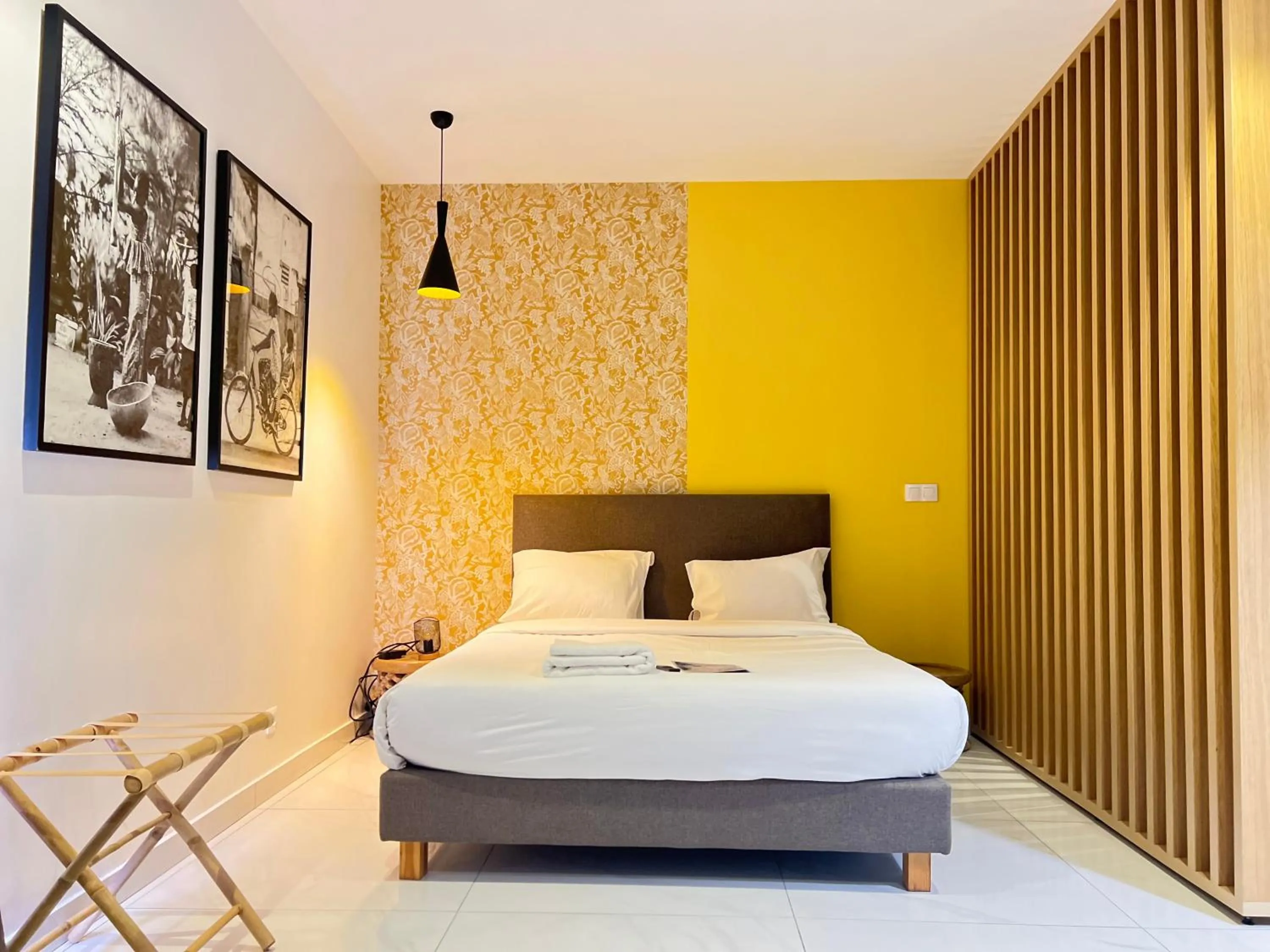 Bed in AfricaWorks Suites