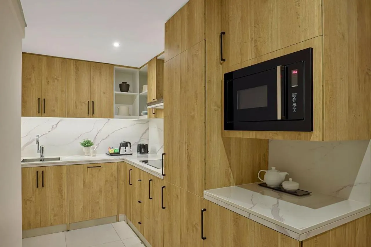 Kitchen or kitchenette in Makarem Haram view suites