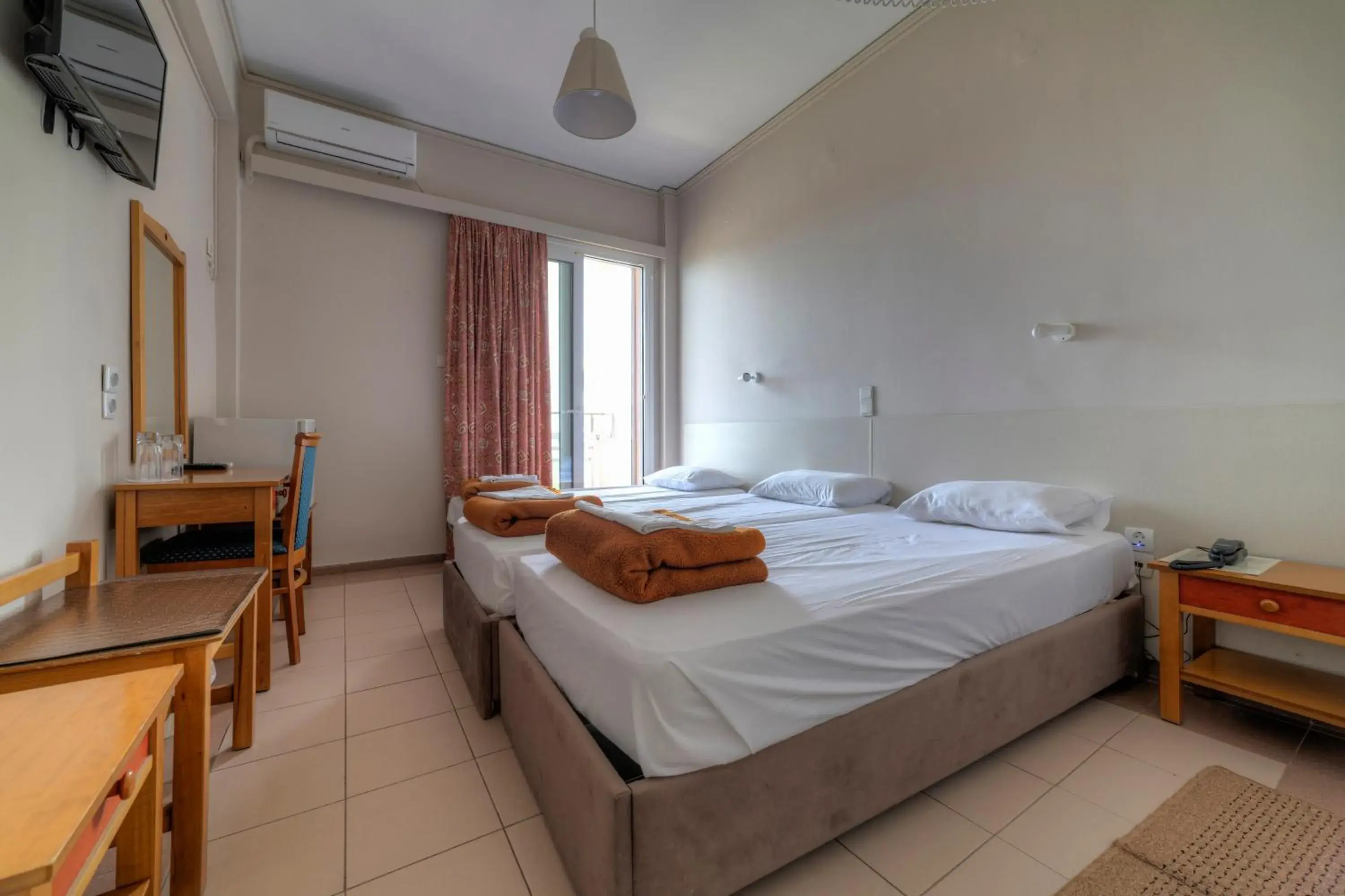 Triple Room with Balcony in Delfini Hotel Triple Room with Balcony in Delfini Hotel