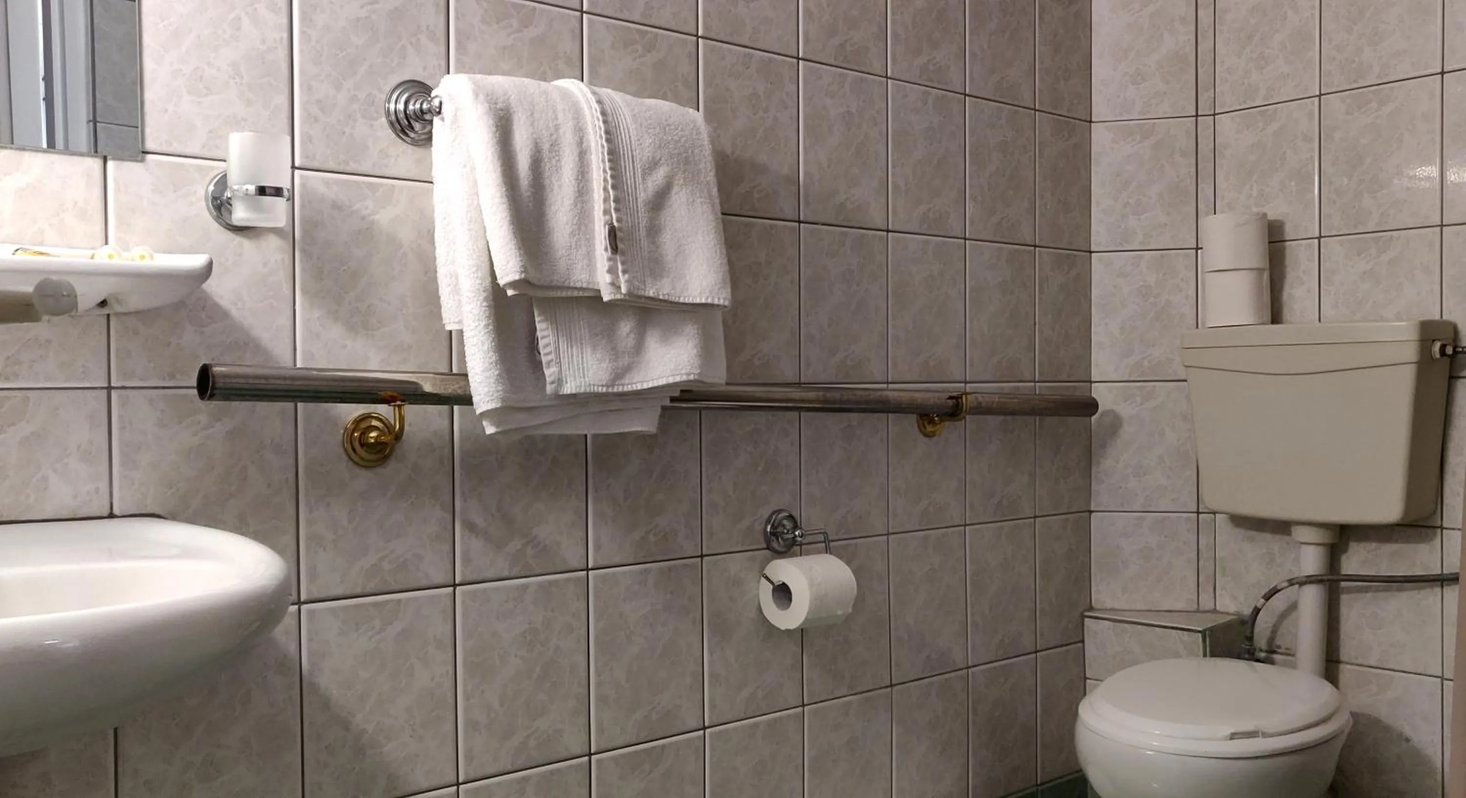 Bathroom in Delfini Hotel