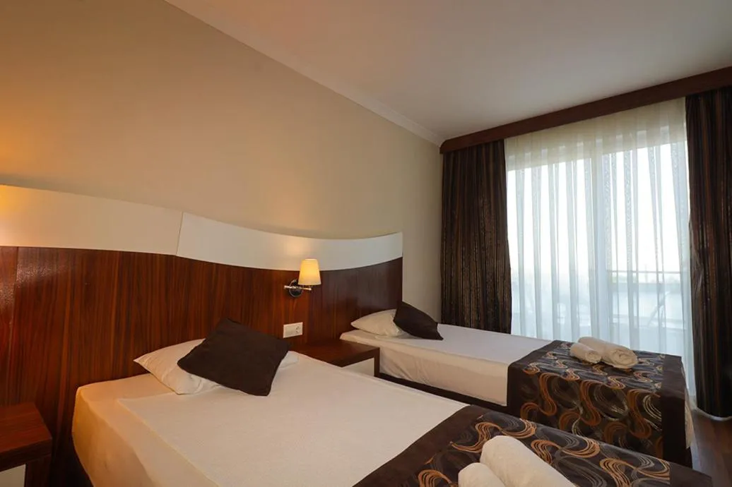 Bedroom in Throne Beach Resort & Spa - Ultra All Inclusive