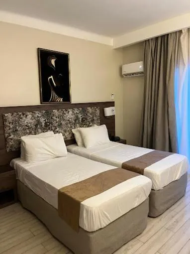 Bed in Rym El Djamil Hotel