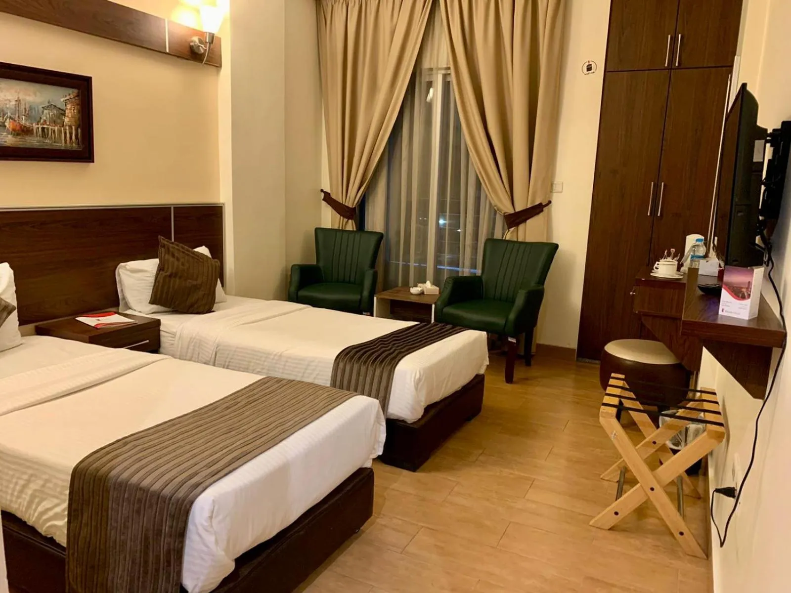 Bed in Ream Hotel Amman