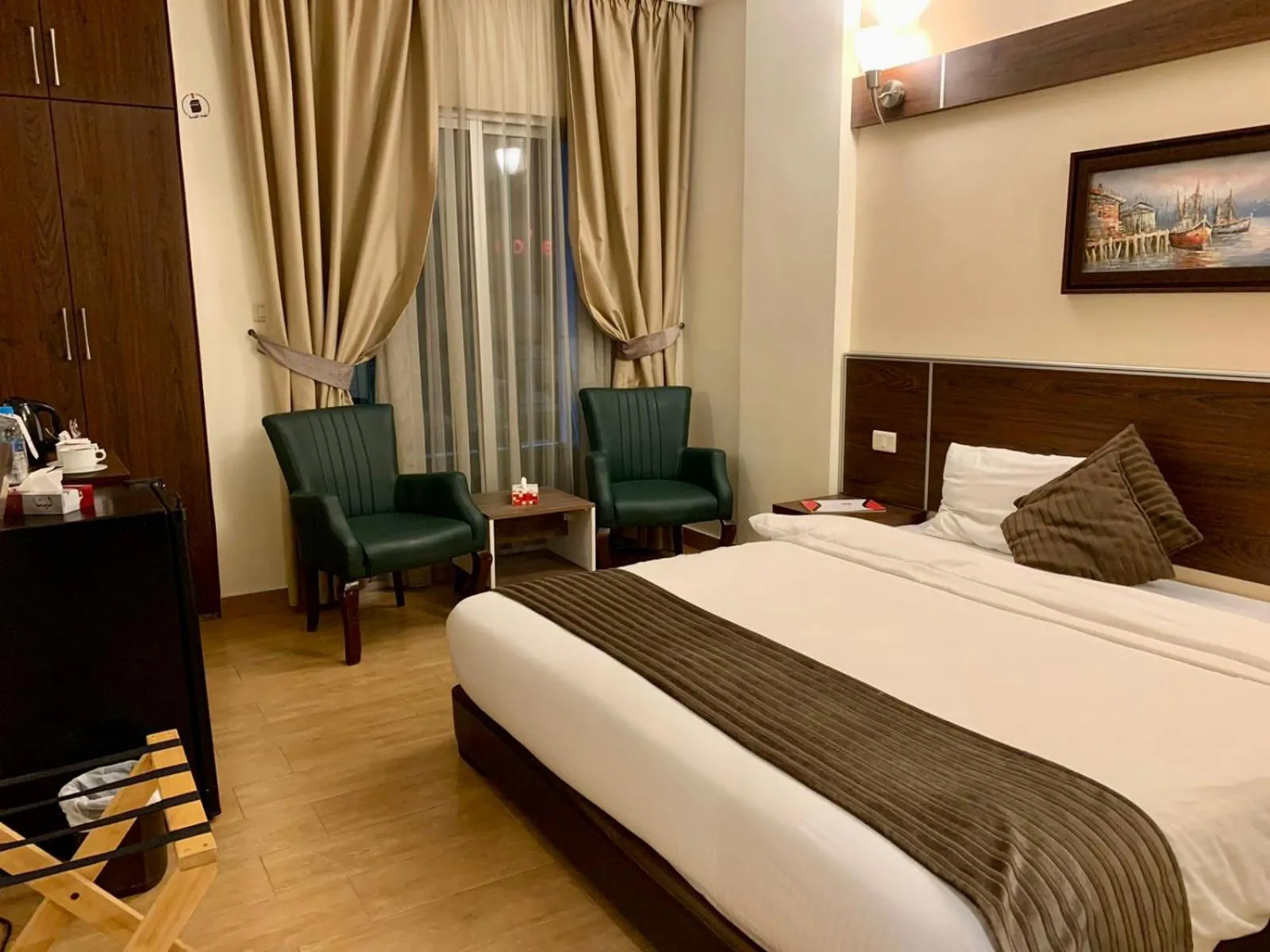 Bed in Ream Hotel Amman