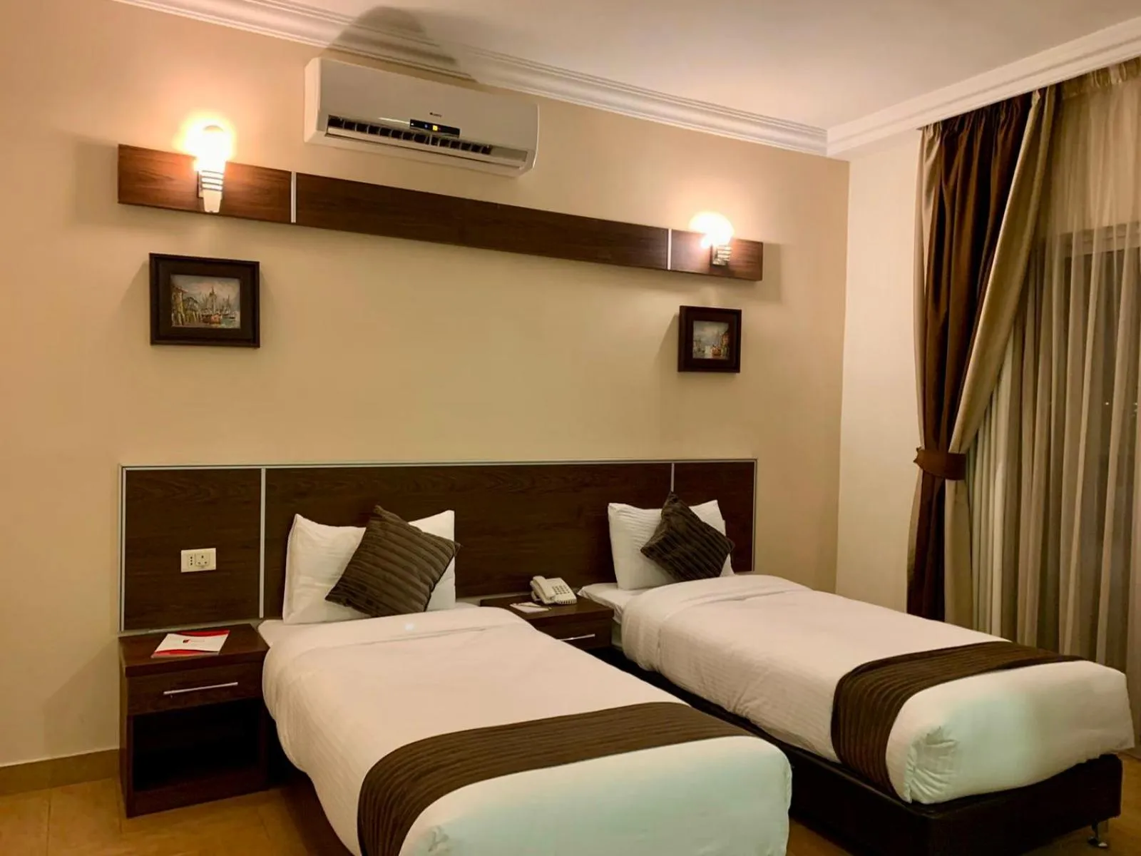 Bed in Ream Hotel Amman