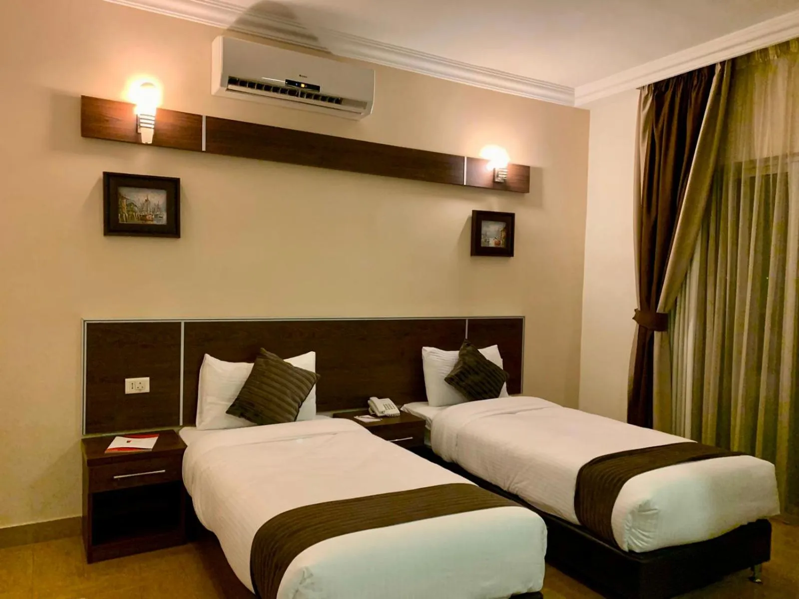 Bed in Ream Hotel Amman