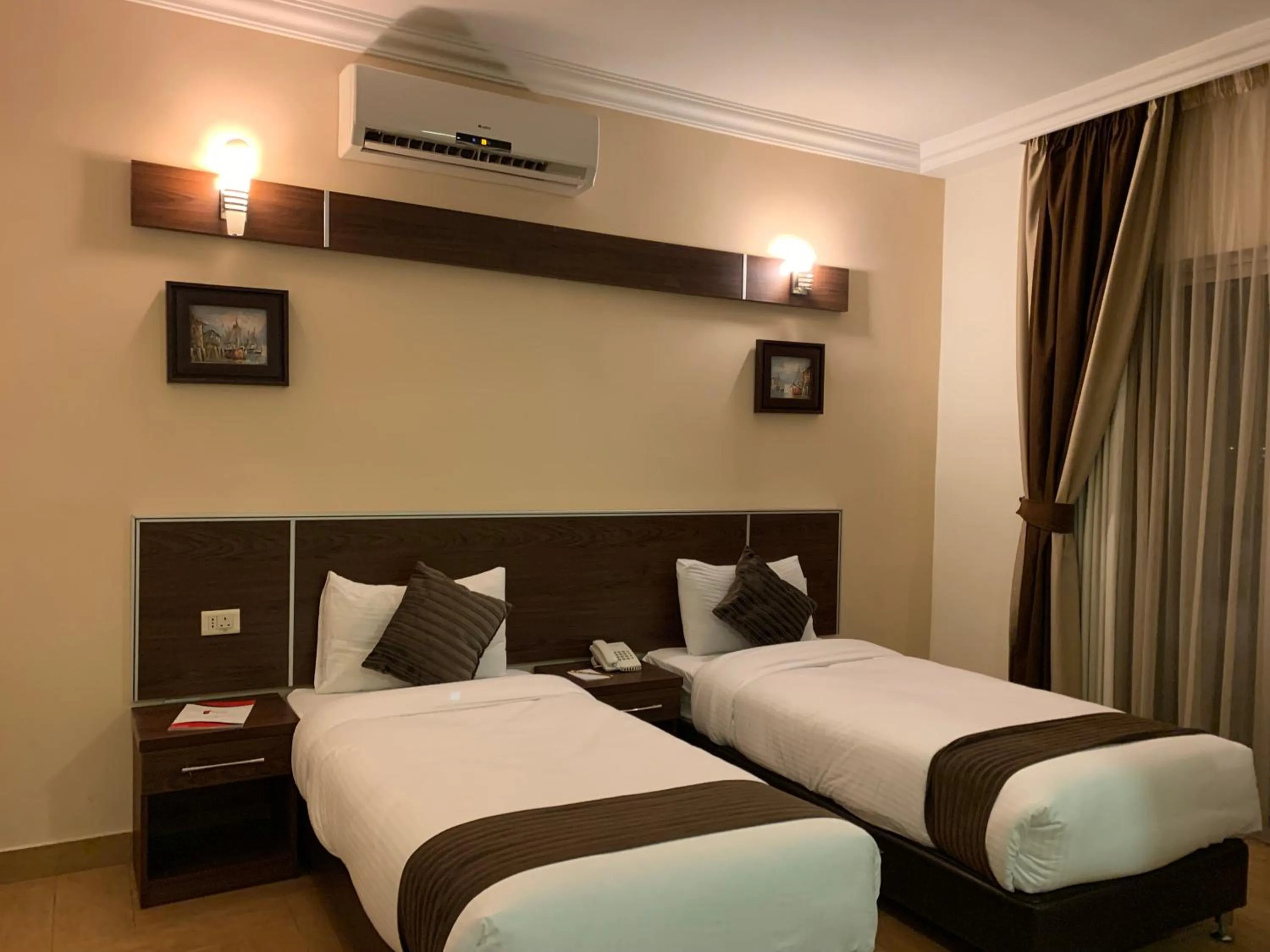 Bed in Ream Hotel Amman