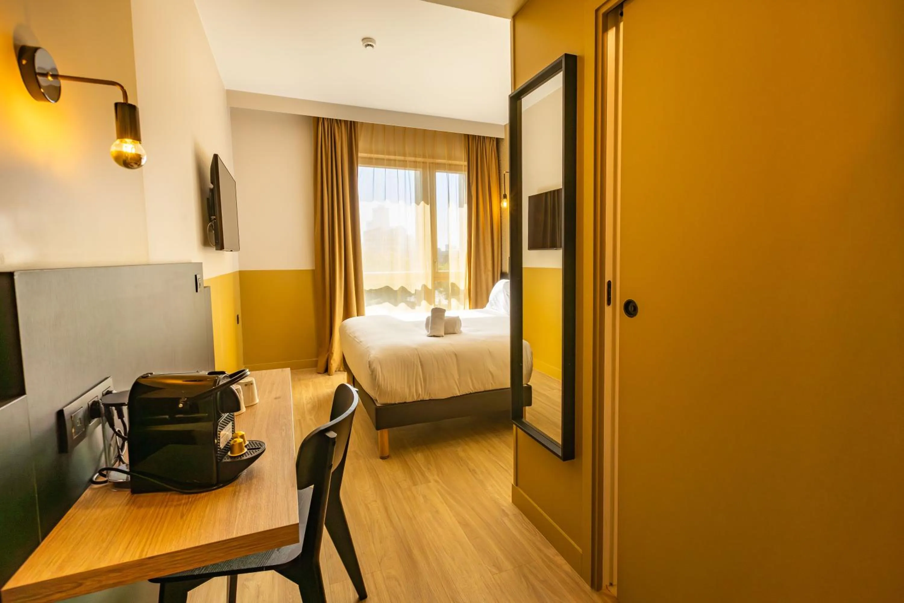 Bed in All Suites Hôtel - Paris Pleyel - L'Île Saint Denis