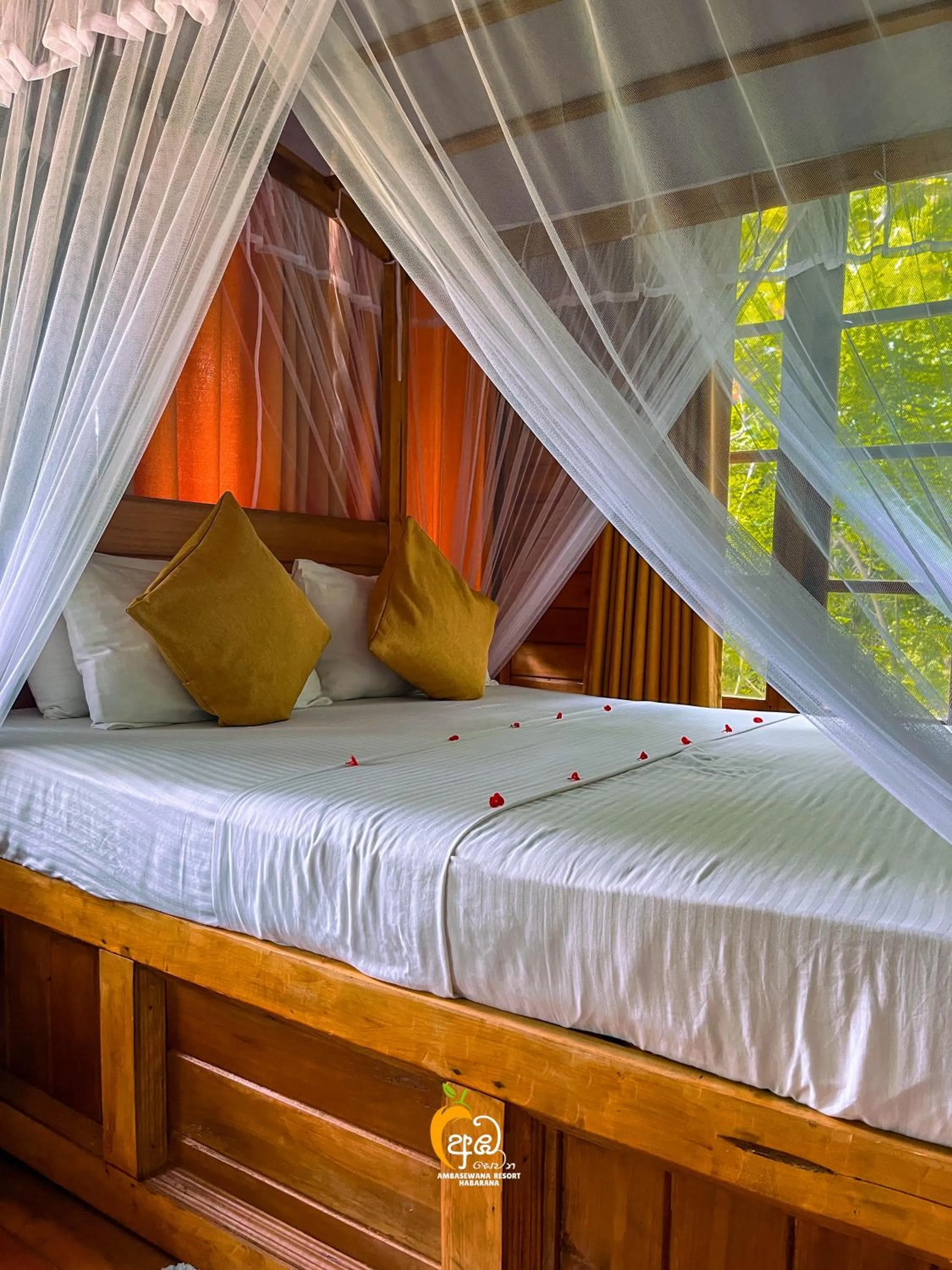 Bed in Habarana Tree House Ambasewana Resort