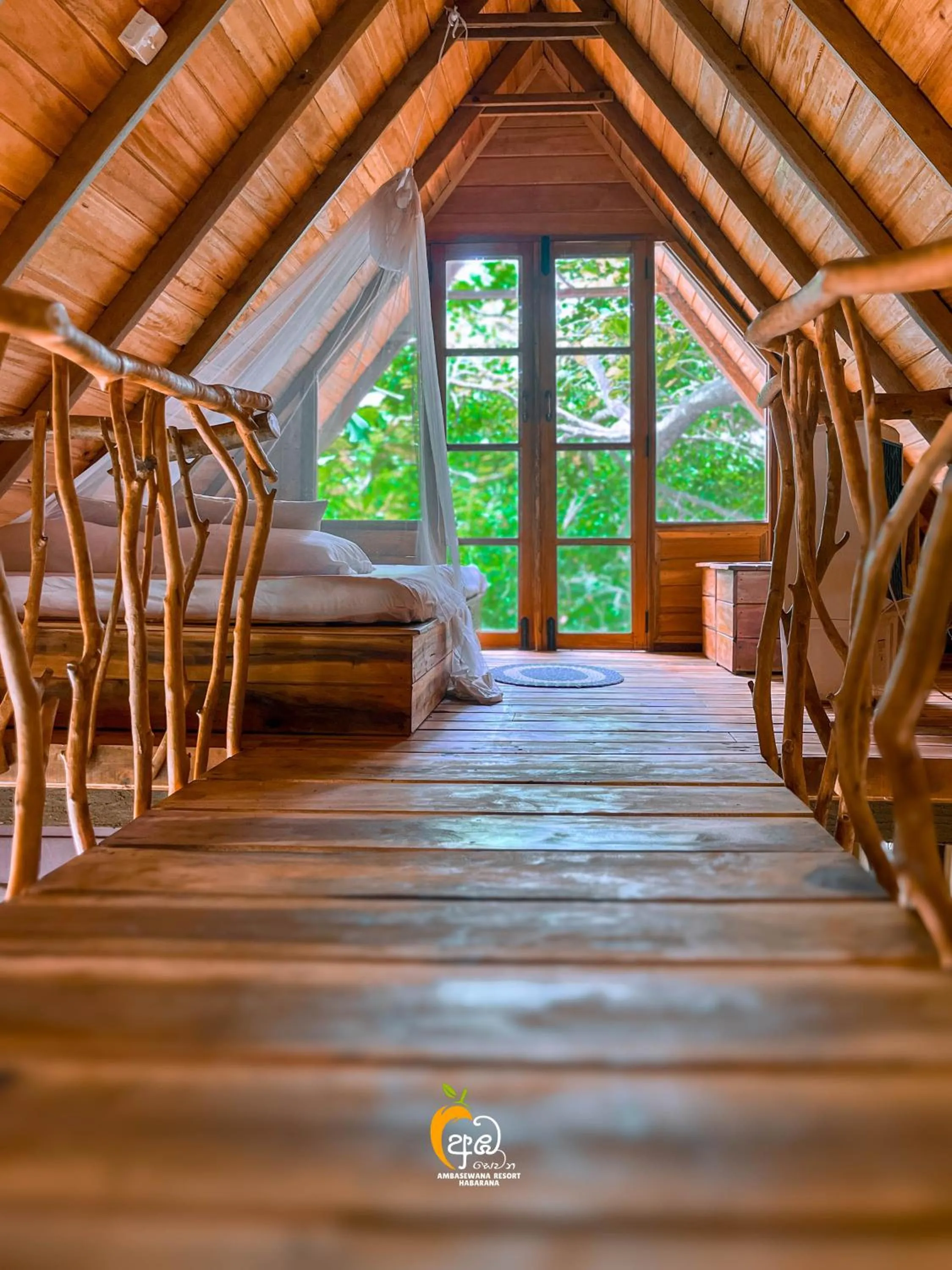 Bed in Habarana Tree House Ambasewana Resort