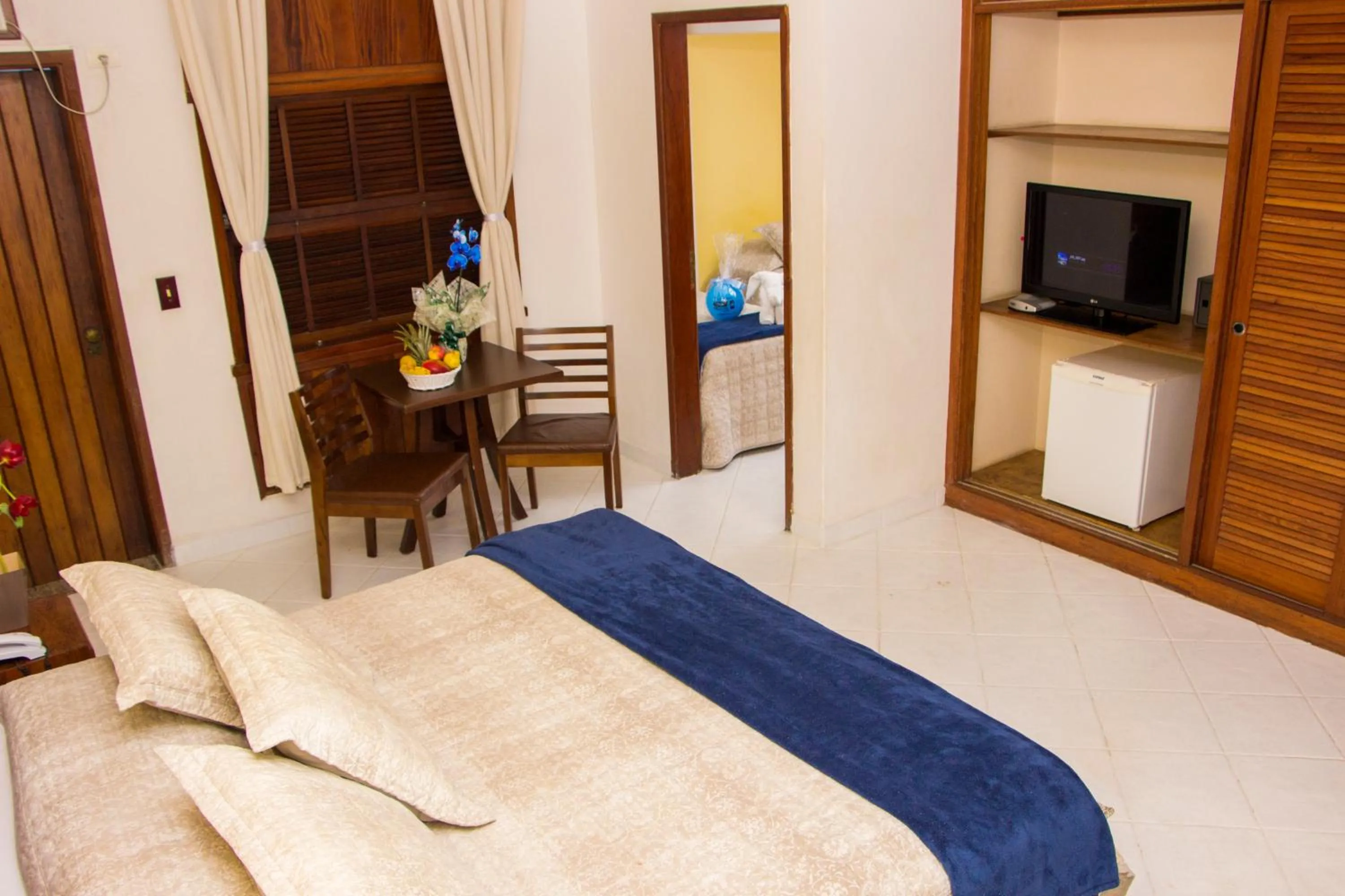 Photo of the whole room, Bed in Senses Praia Hotel